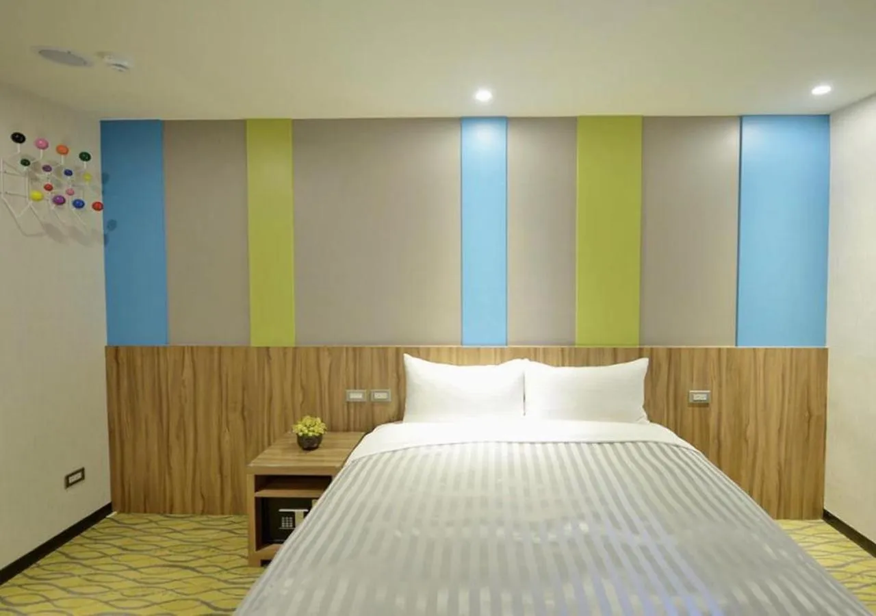 Bed in 西門大飯店 Ximen Hotel