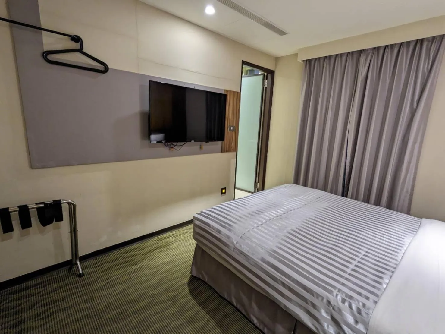 Bed in 西門大飯店 Ximen Hotel