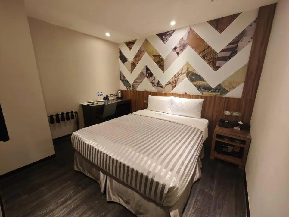 Bed in 西門大飯店 Ximen Hotel