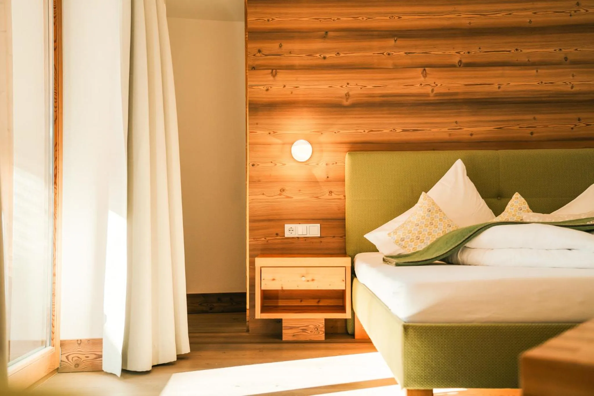 Bed in Hotel Glemmtalerhof