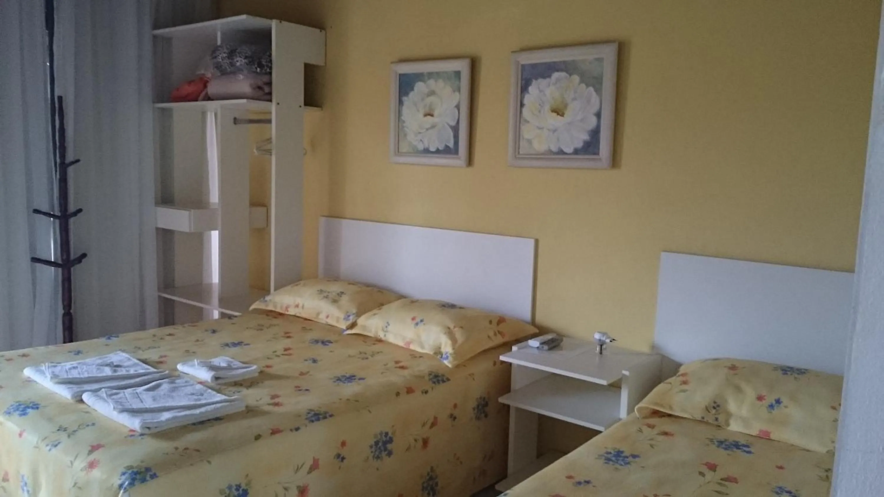 Bed in Pousada Água Marinha