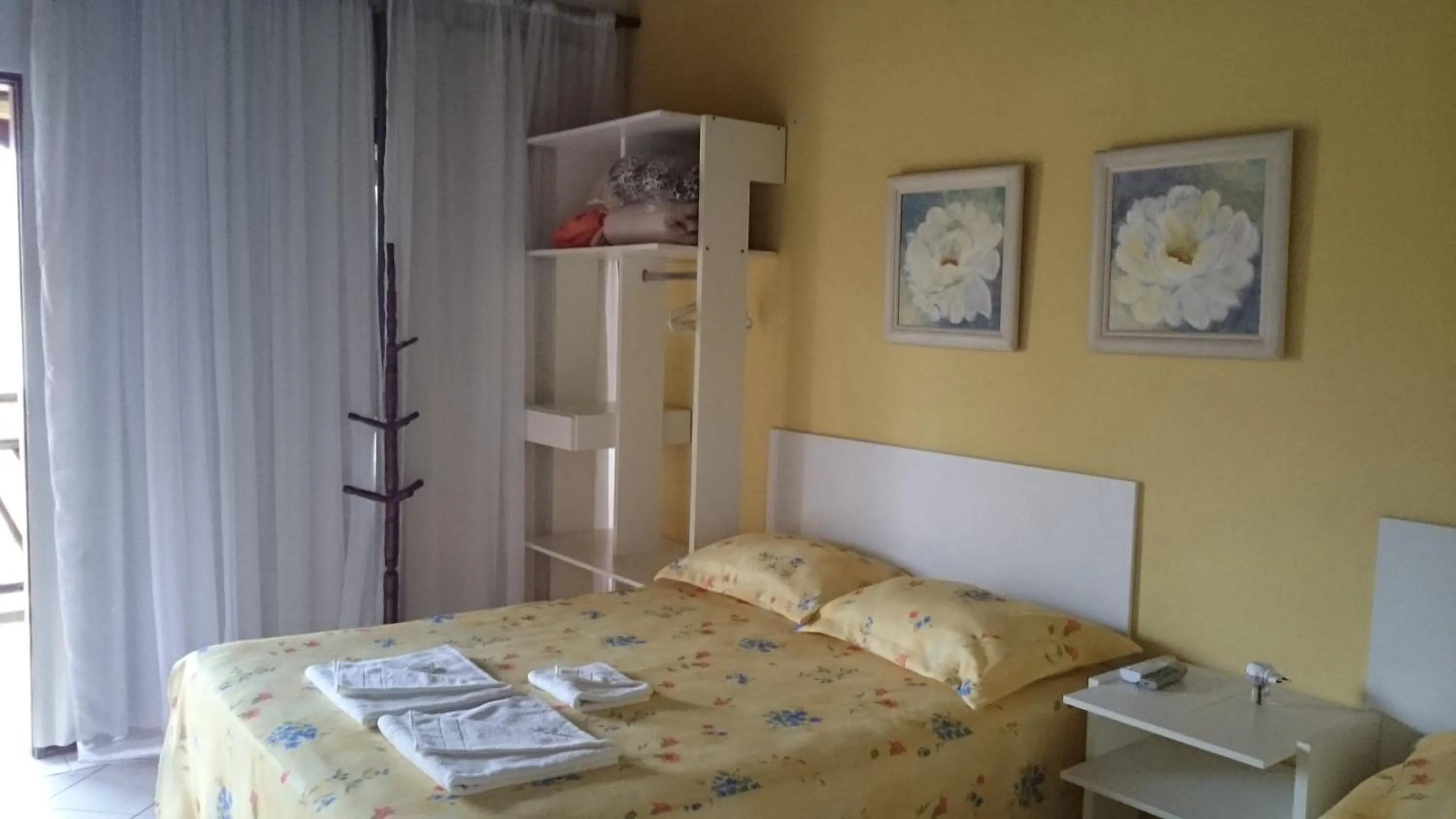 Bed in Pousada Água Marinha