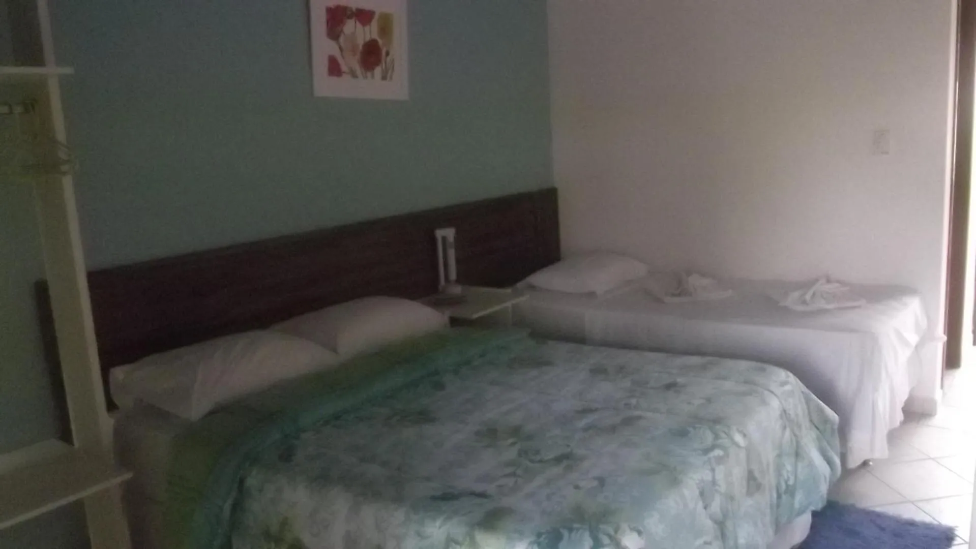Bed in Pousada Água Marinha