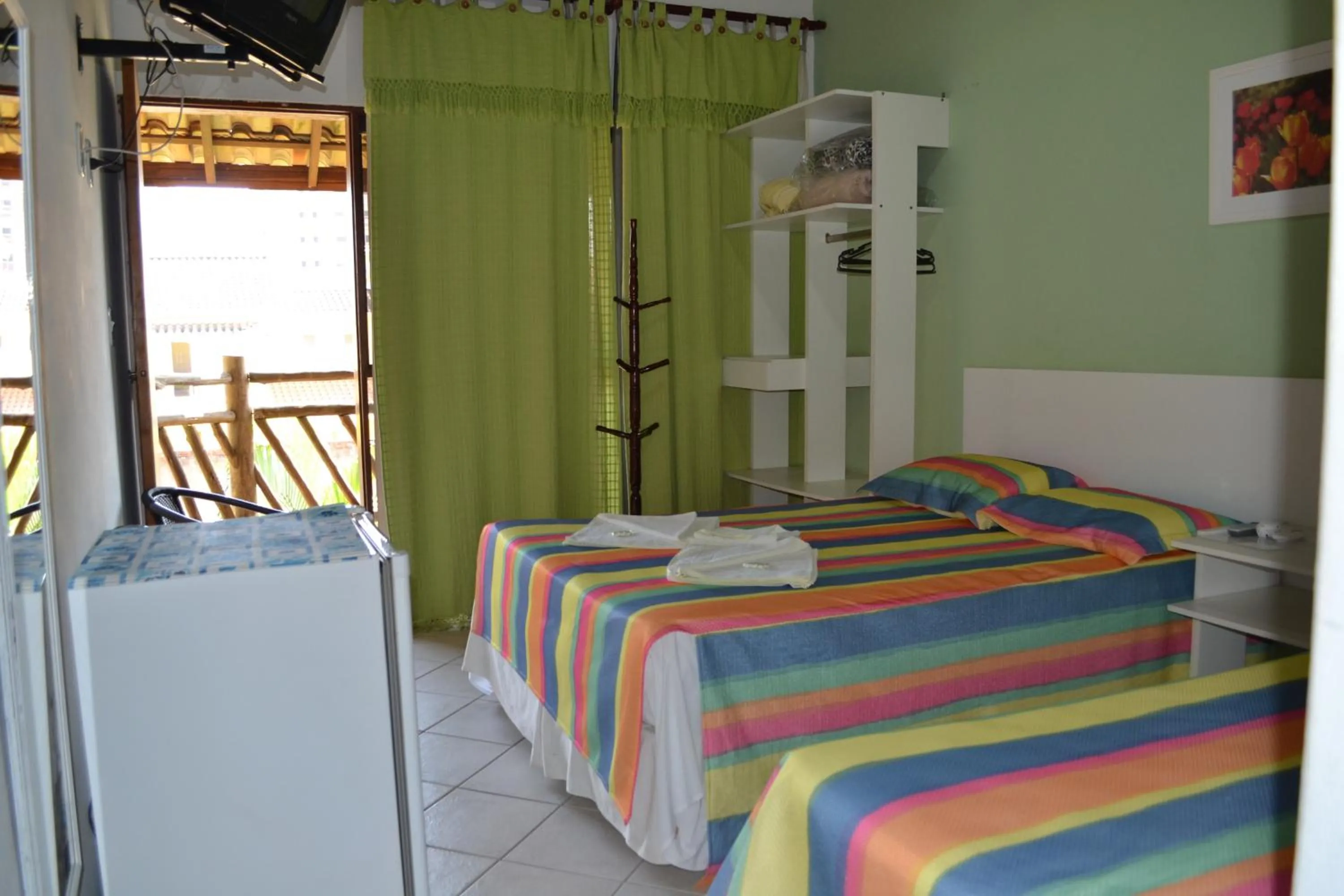 Bed in Pousada Água Marinha