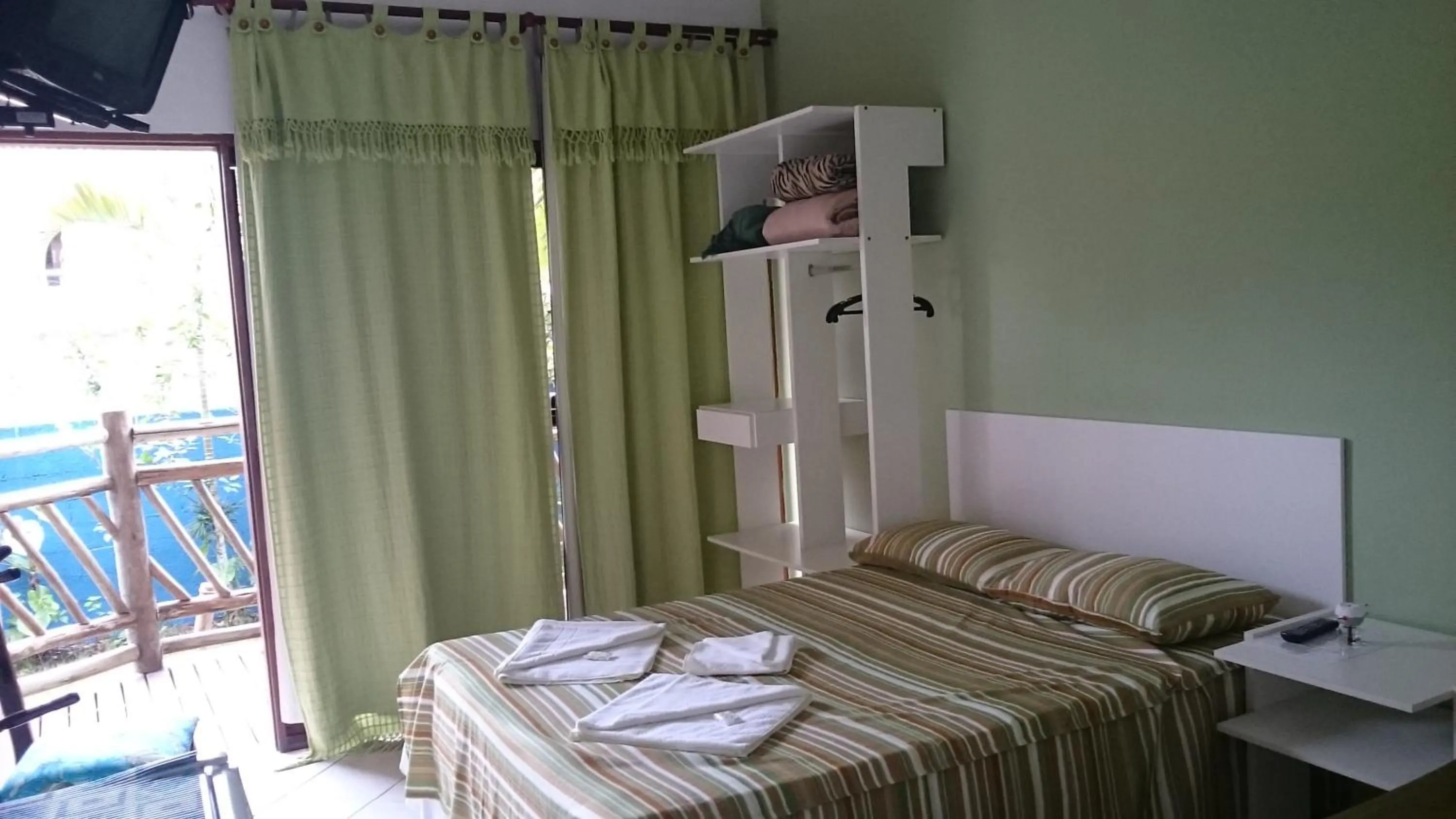 Bed in Pousada Água Marinha