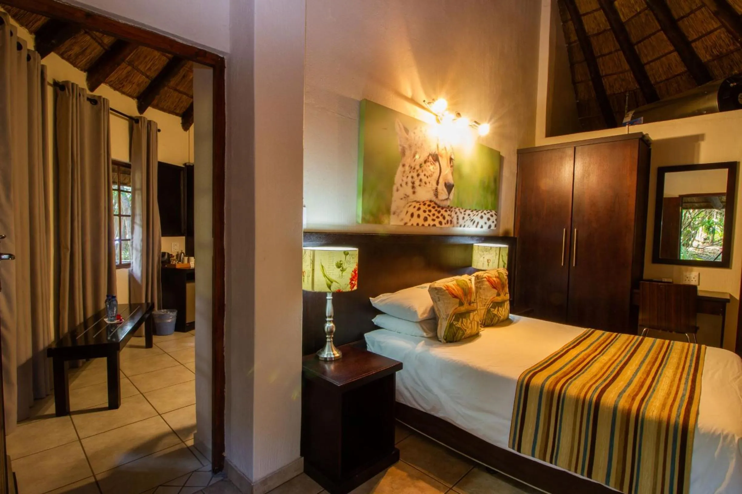 Bed in Emdoneni Lodge with Zululand Cat Conservation Project