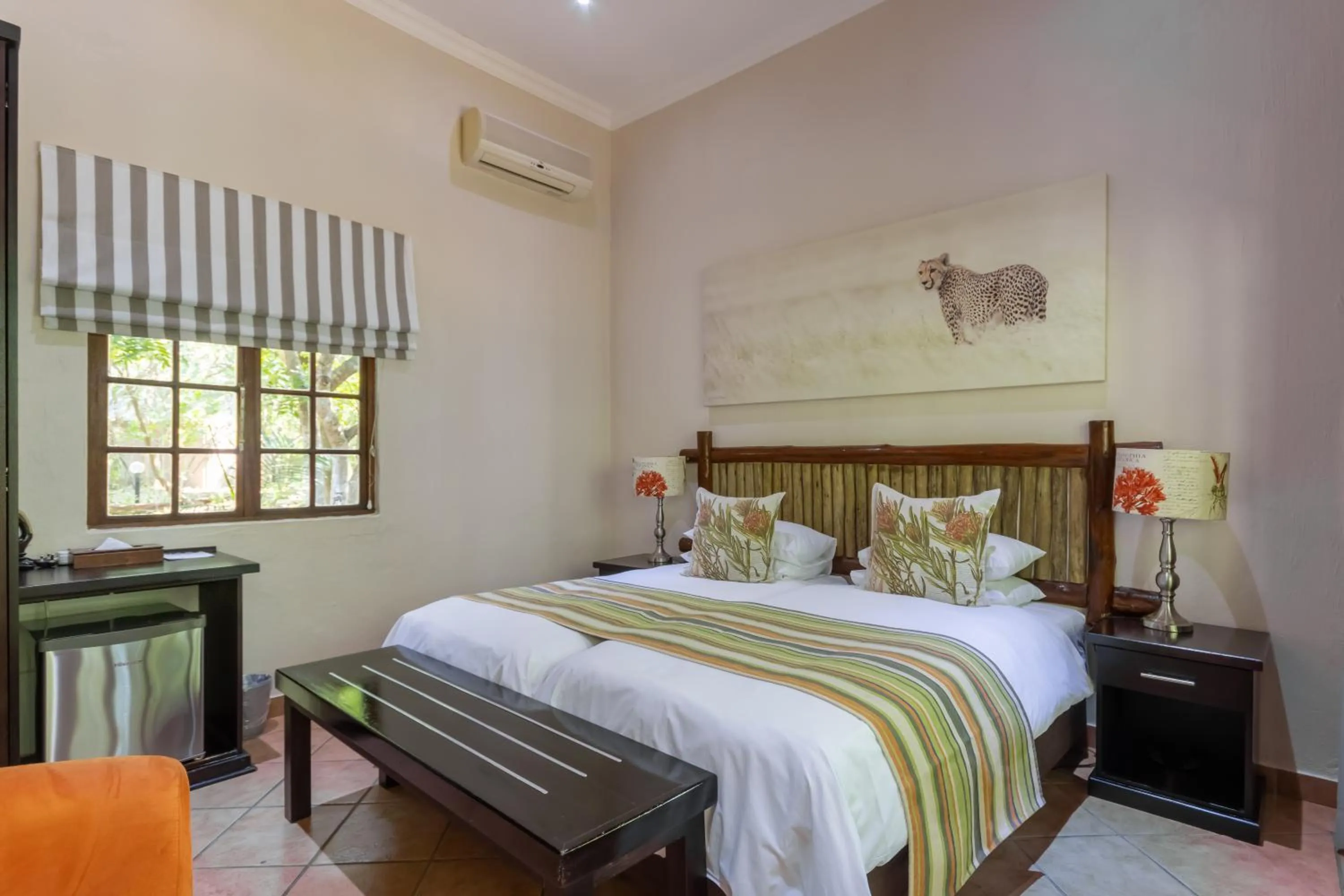 Bed in Emdoneni Lodge with Zululand Cat Conservation Project