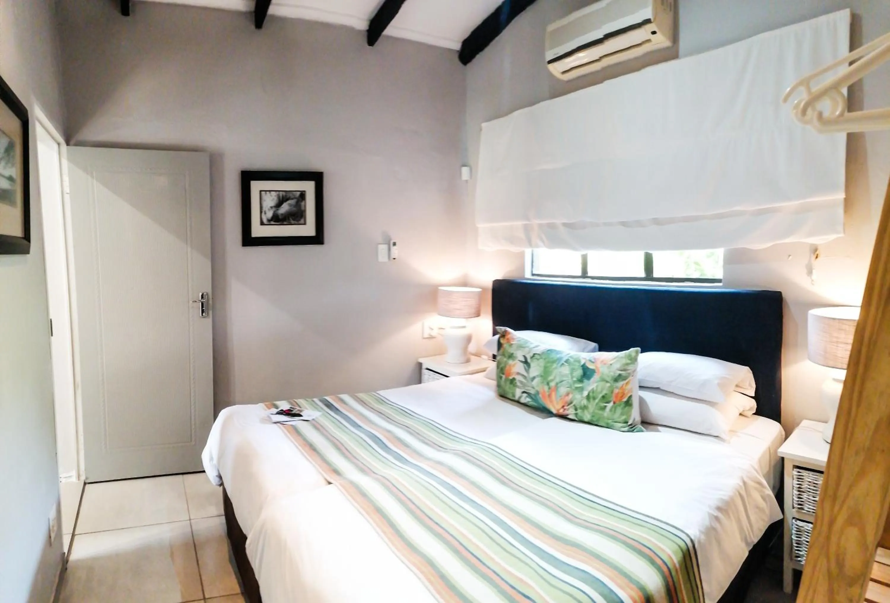 Bed in Emdoneni Lodge with Zululand Cat Conservation Project