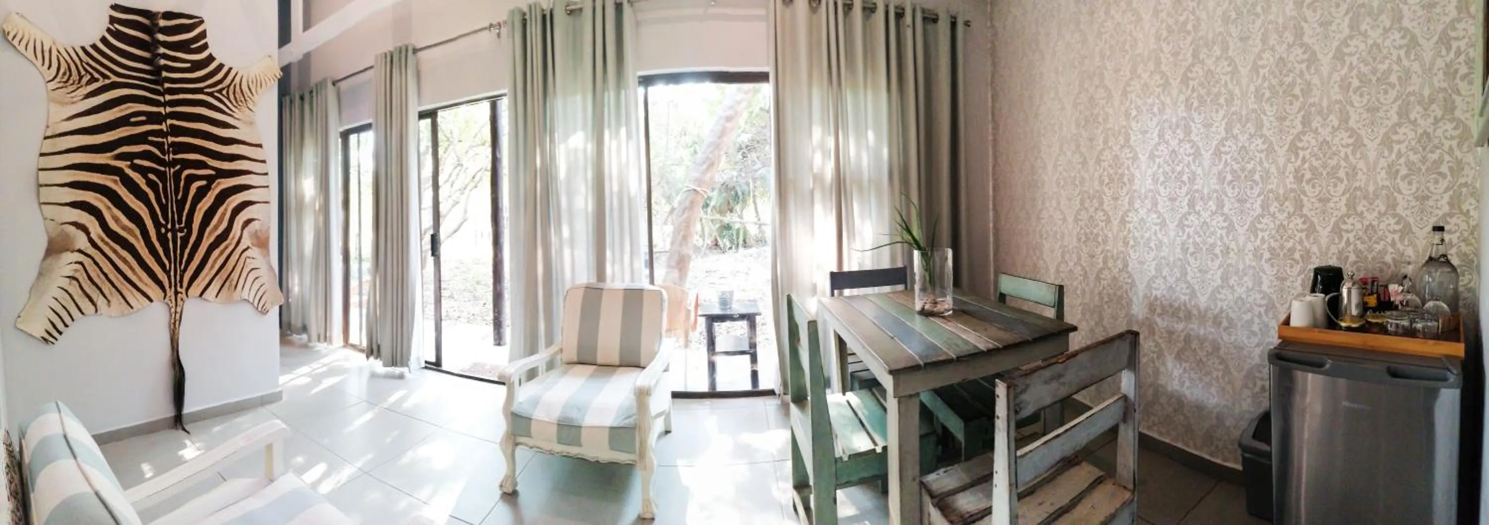 Living room in Emdoneni Lodge with Zululand Cat Conservation Project