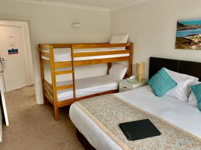 Bed in La Collinette Hotel, Cottages & Apartments