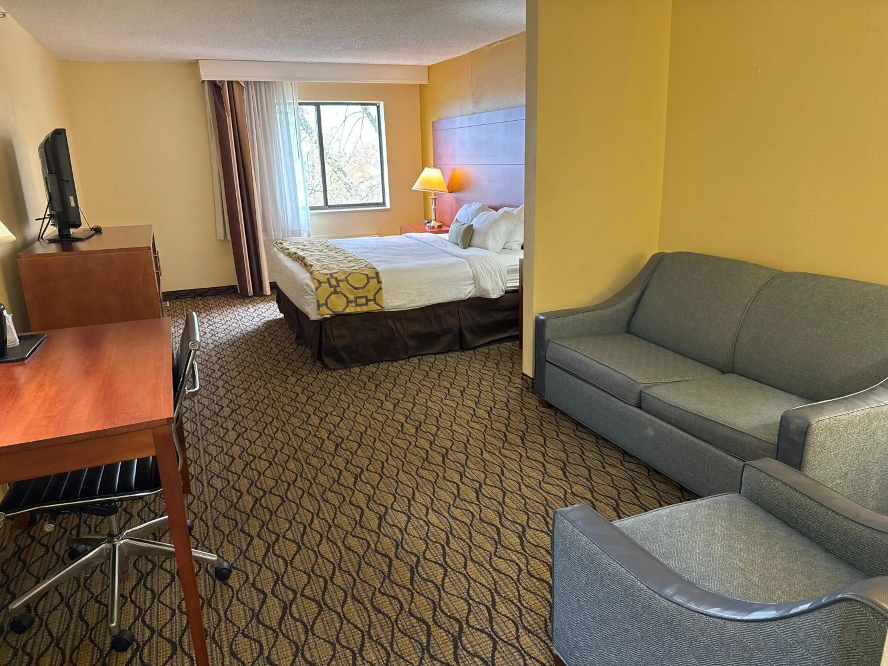 Bed in Baymont by Wyndham Mishawaka South Bend Area