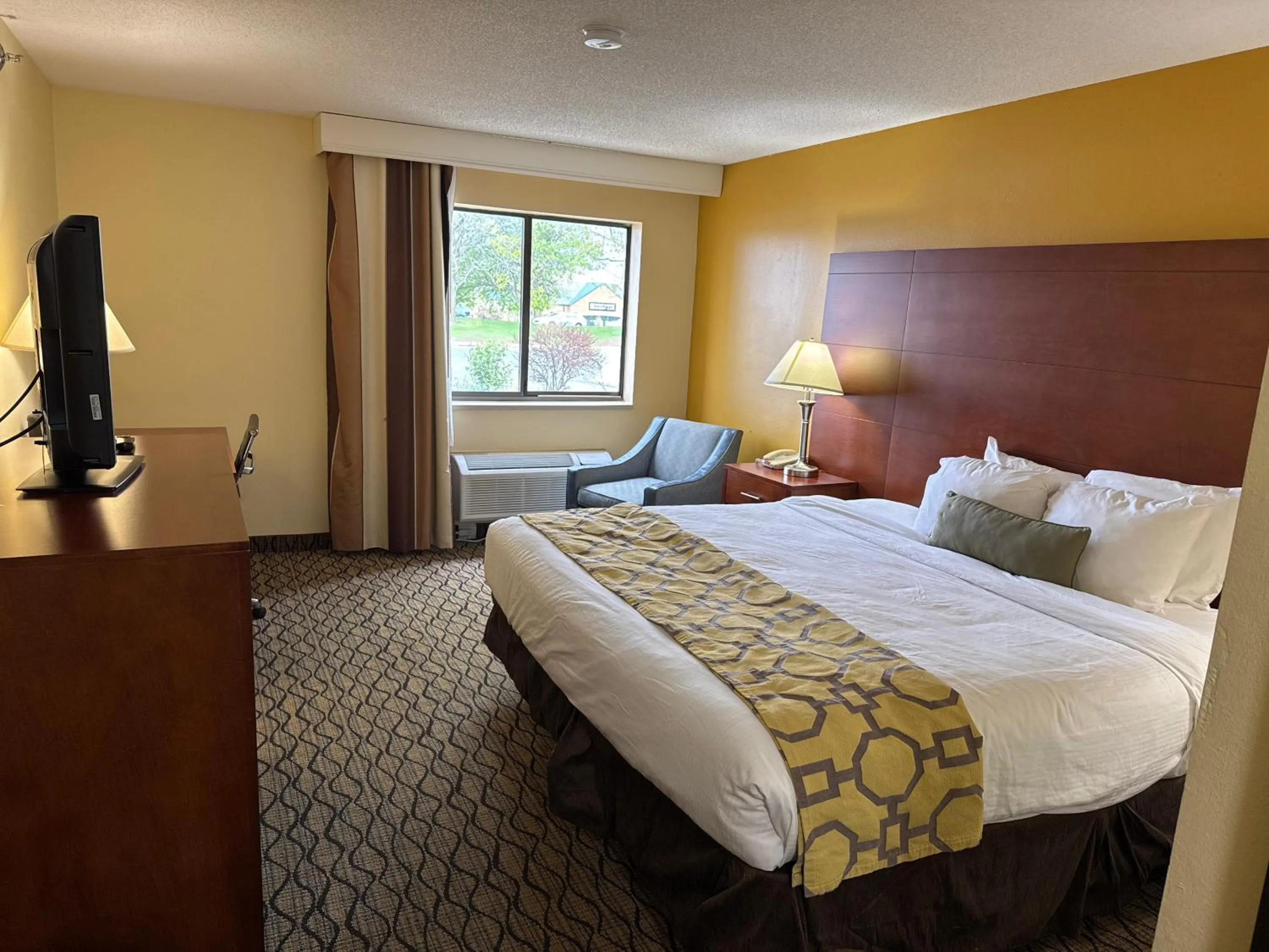 Bed in Baymont by Wyndham Mishawaka South Bend Area