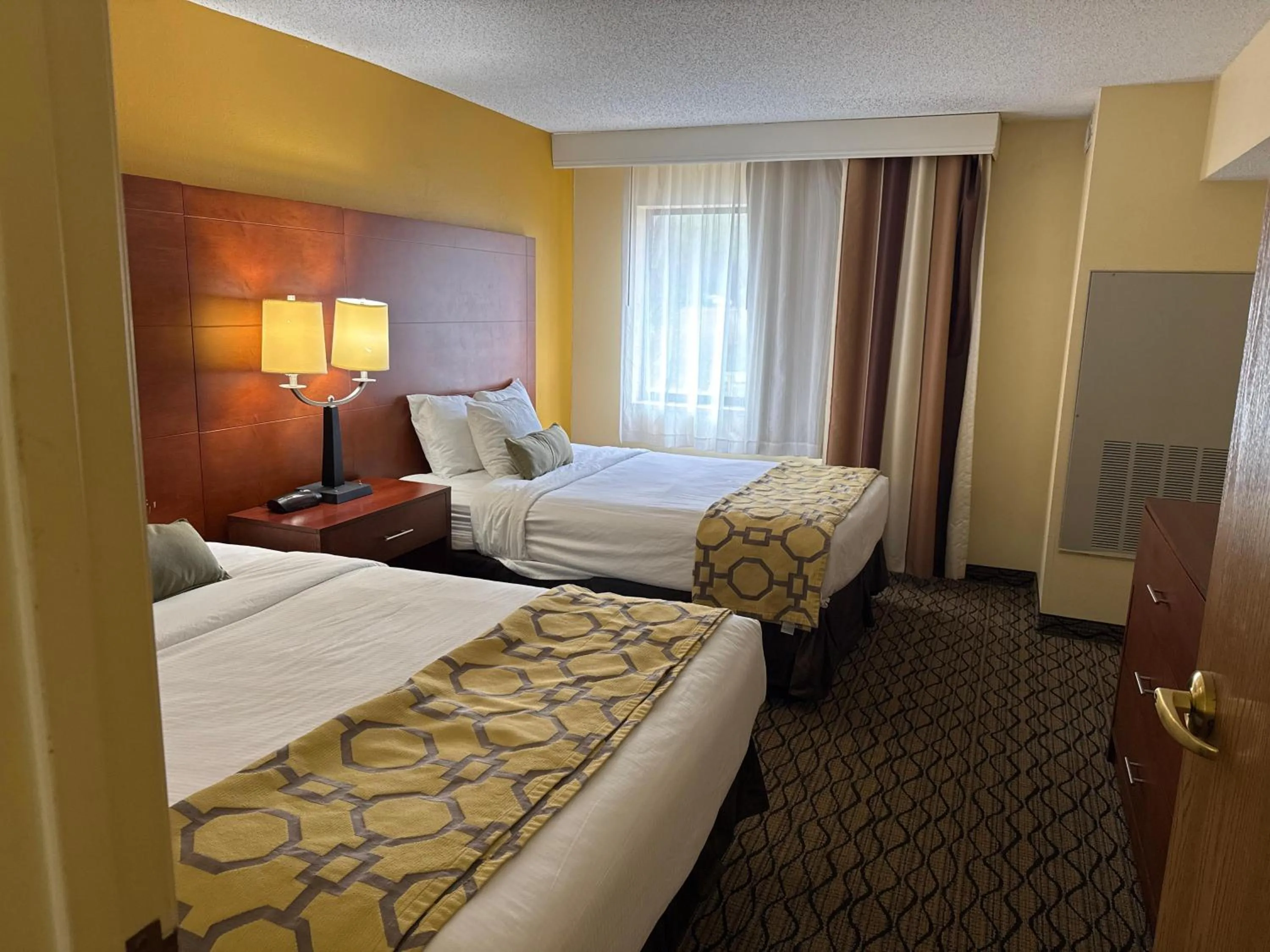 Bed in Baymont by Wyndham Mishawaka South Bend Area