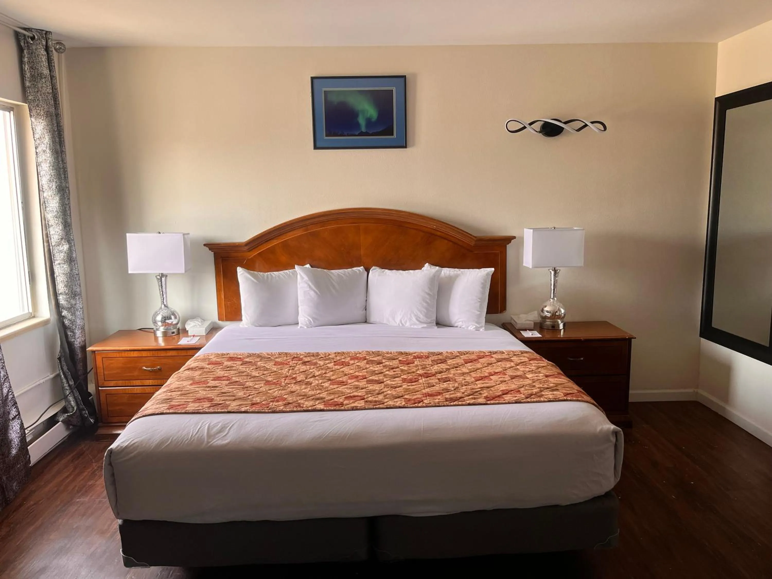 Bed in Ramada Downtown by Wyndham Anchorage