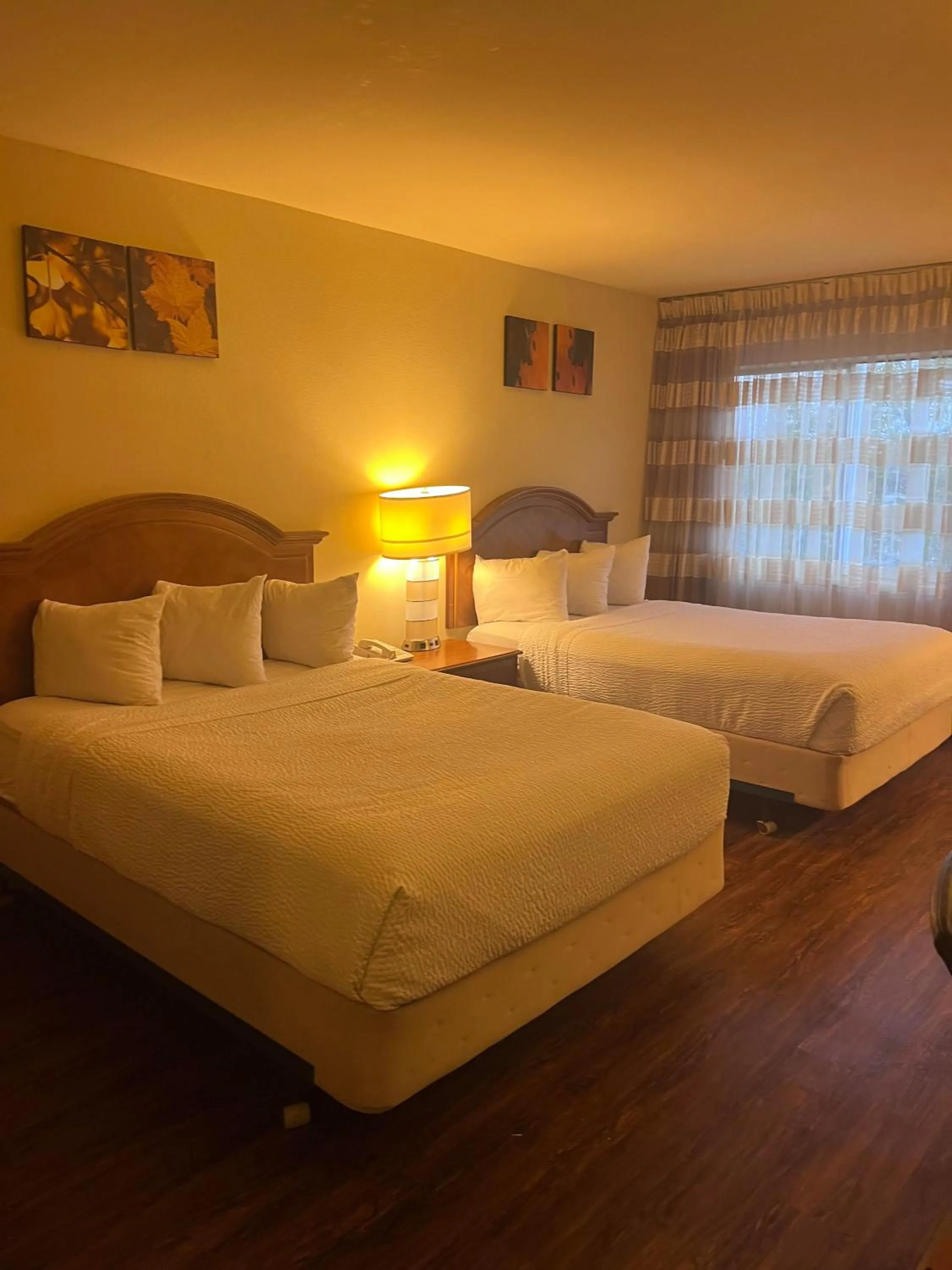 Bed in Ramada Downtown by Wyndham Anchorage