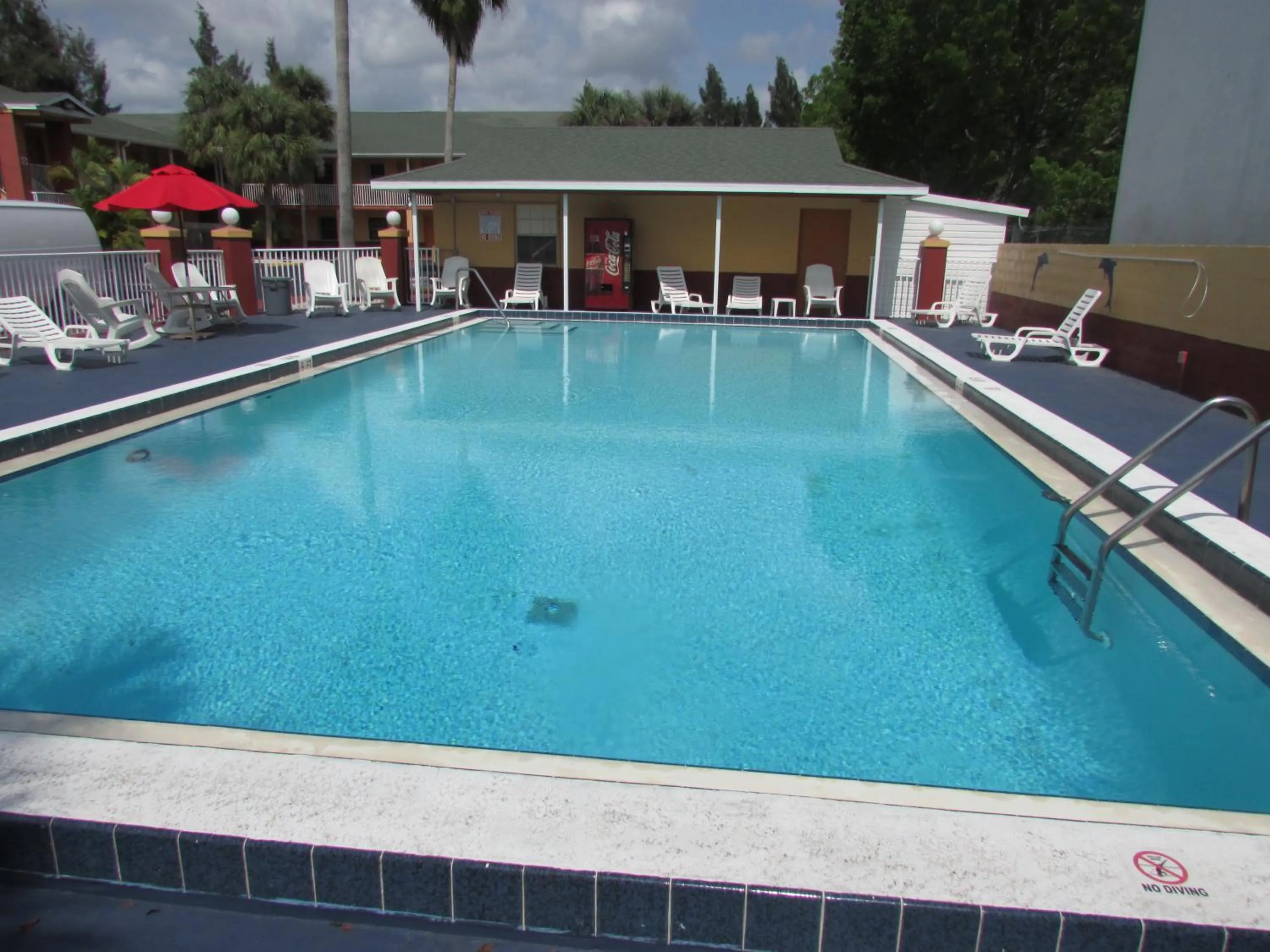 Swimming pool in Howard Johnson by Wyndham Ft. Myers FL