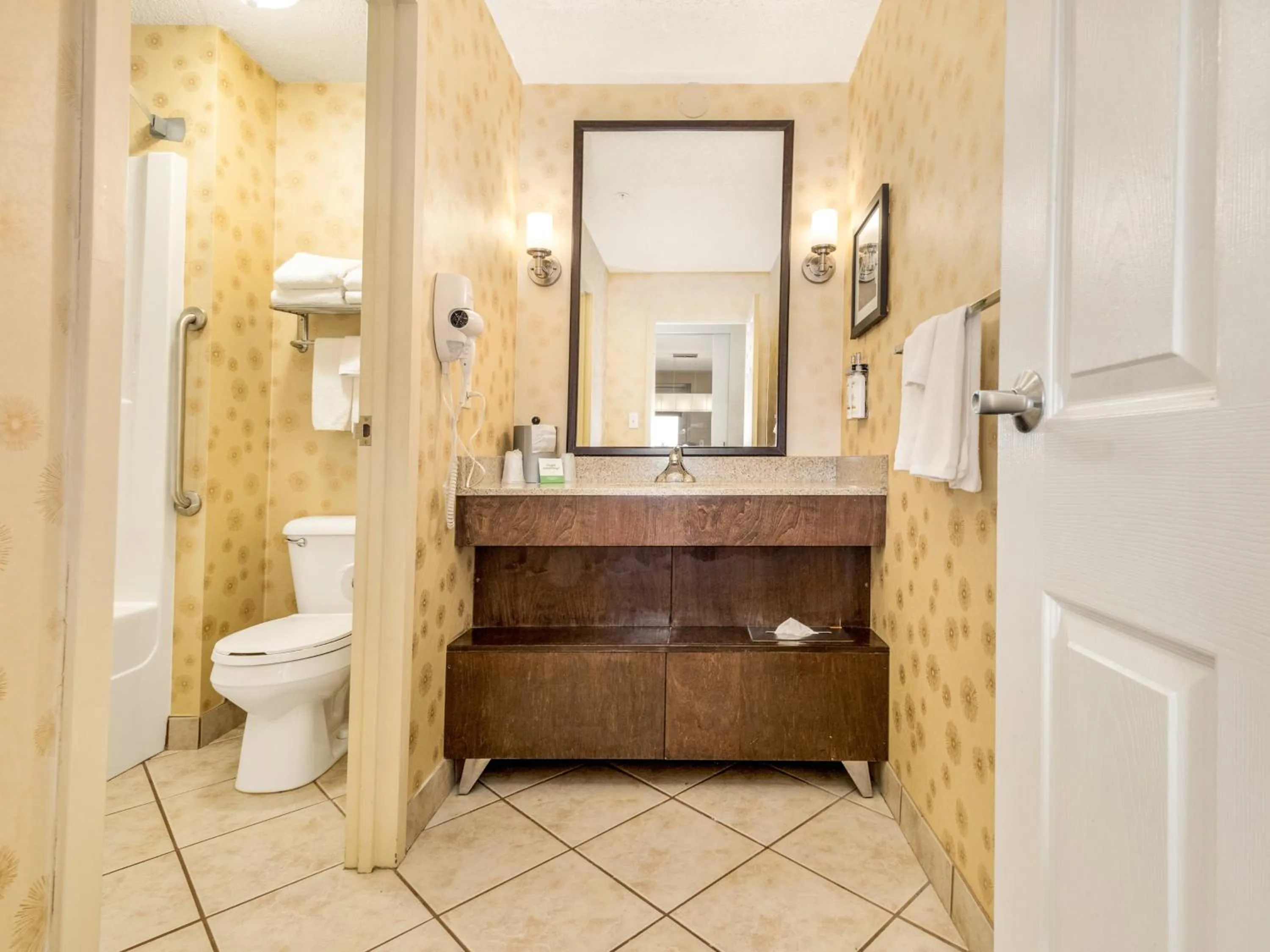 Toilet in Holiday Inn Lethbridge by IHG