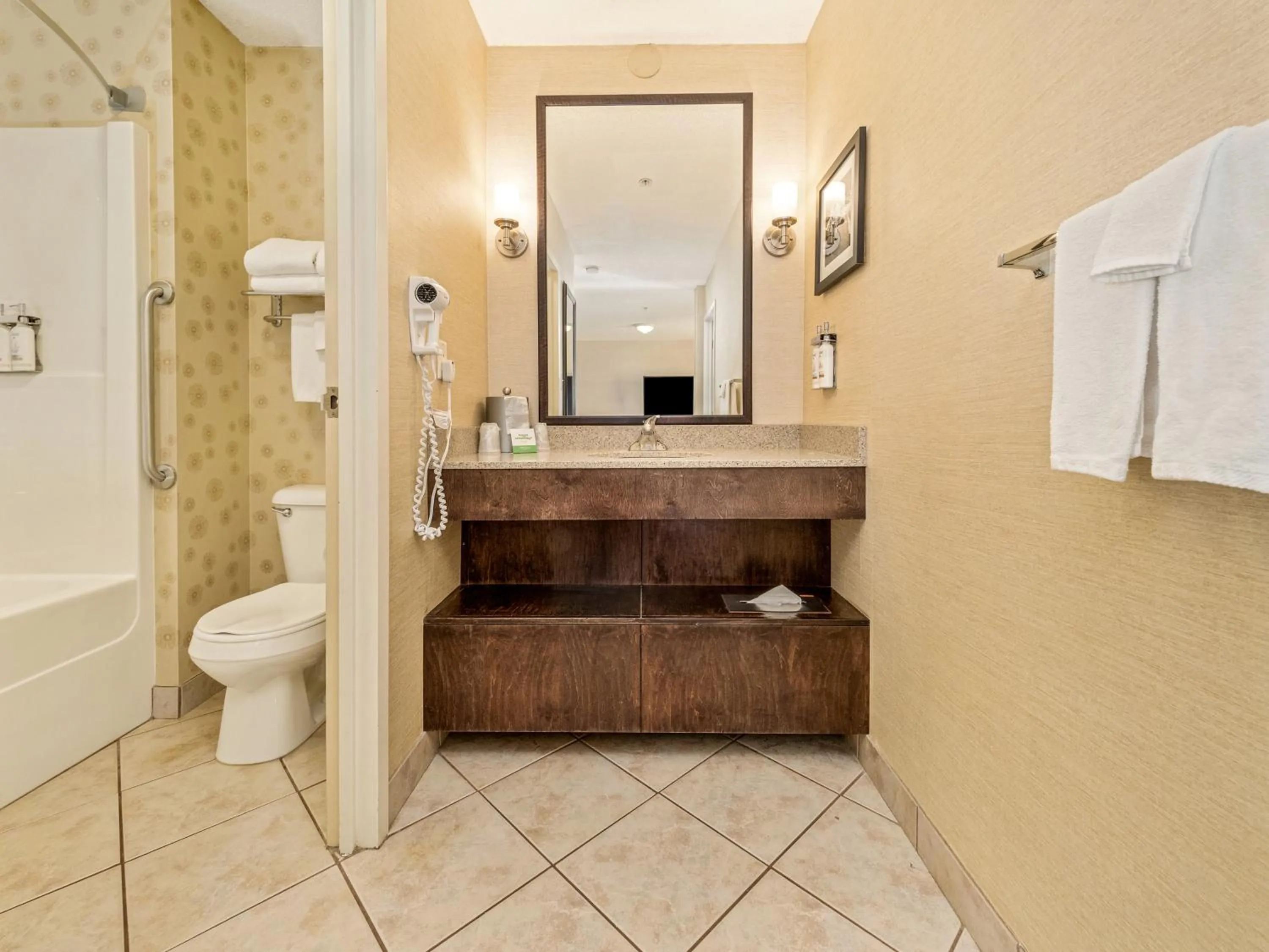 Toilet in Holiday Inn Lethbridge by IHG