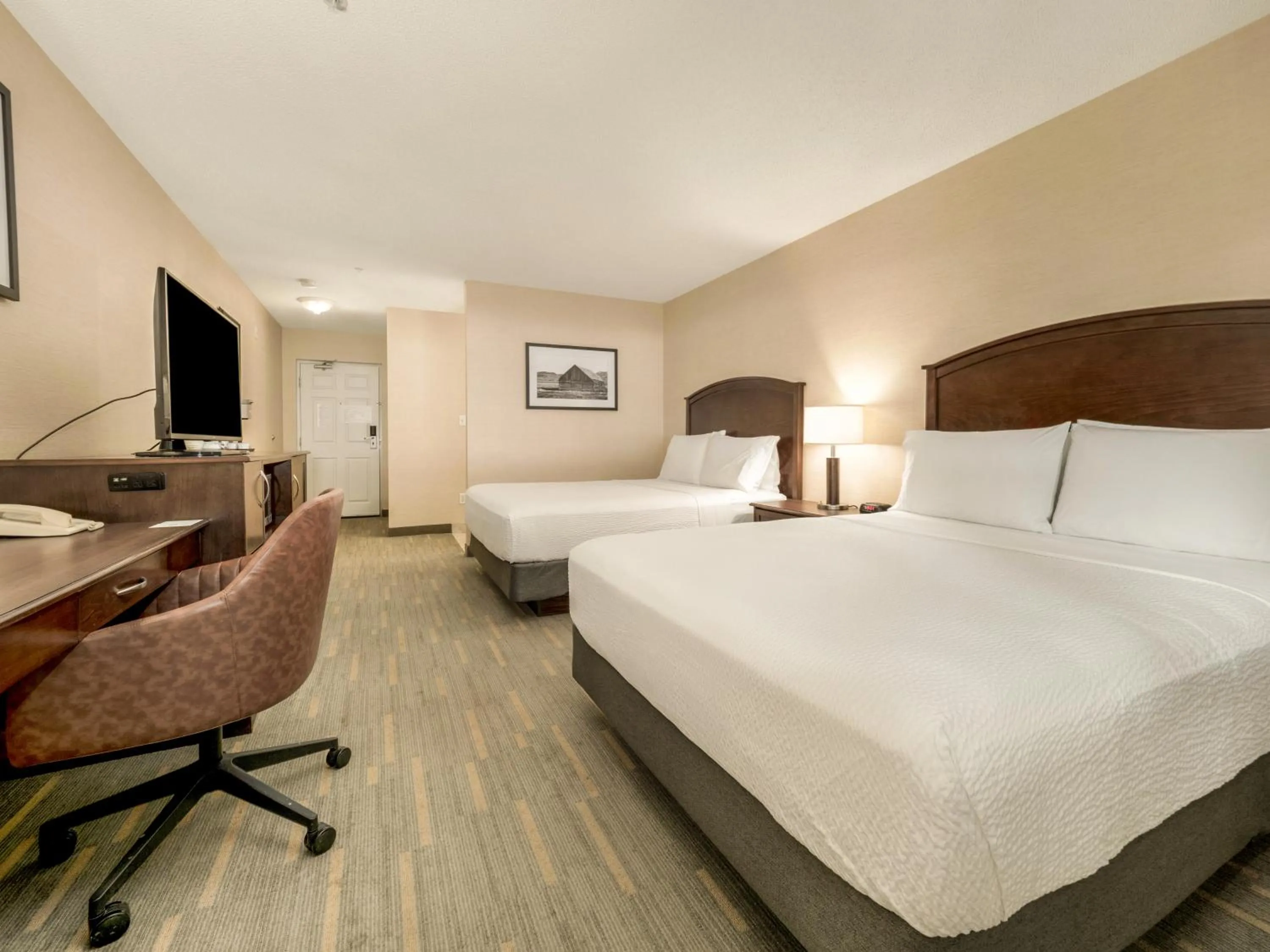 Seating area, Bed in Holiday Inn Lethbridge by IHG