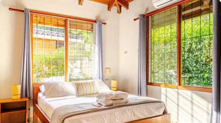 Bed in Bahia Esmeralda Boutique Hotel & Villas