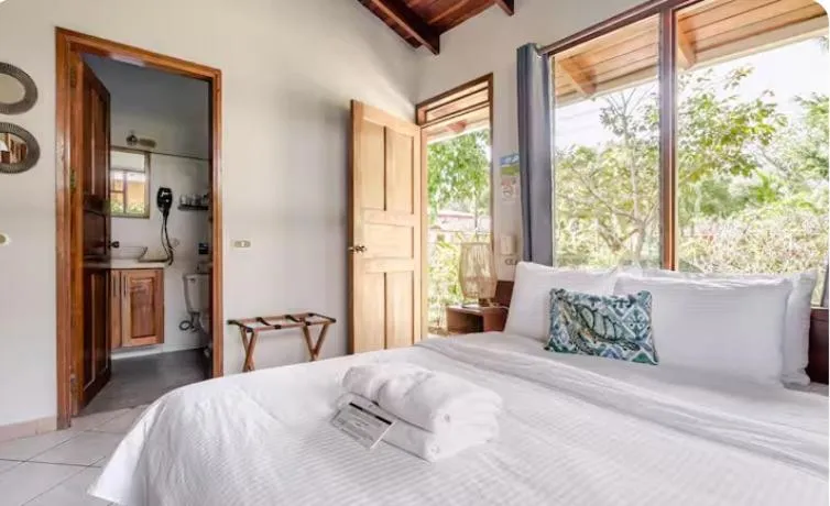 Bed in Bahia Esmeralda Boutique Hotel & Villas