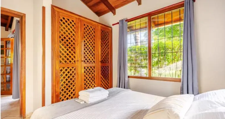 Bed in Bahia Esmeralda Boutique Hotel & Villas