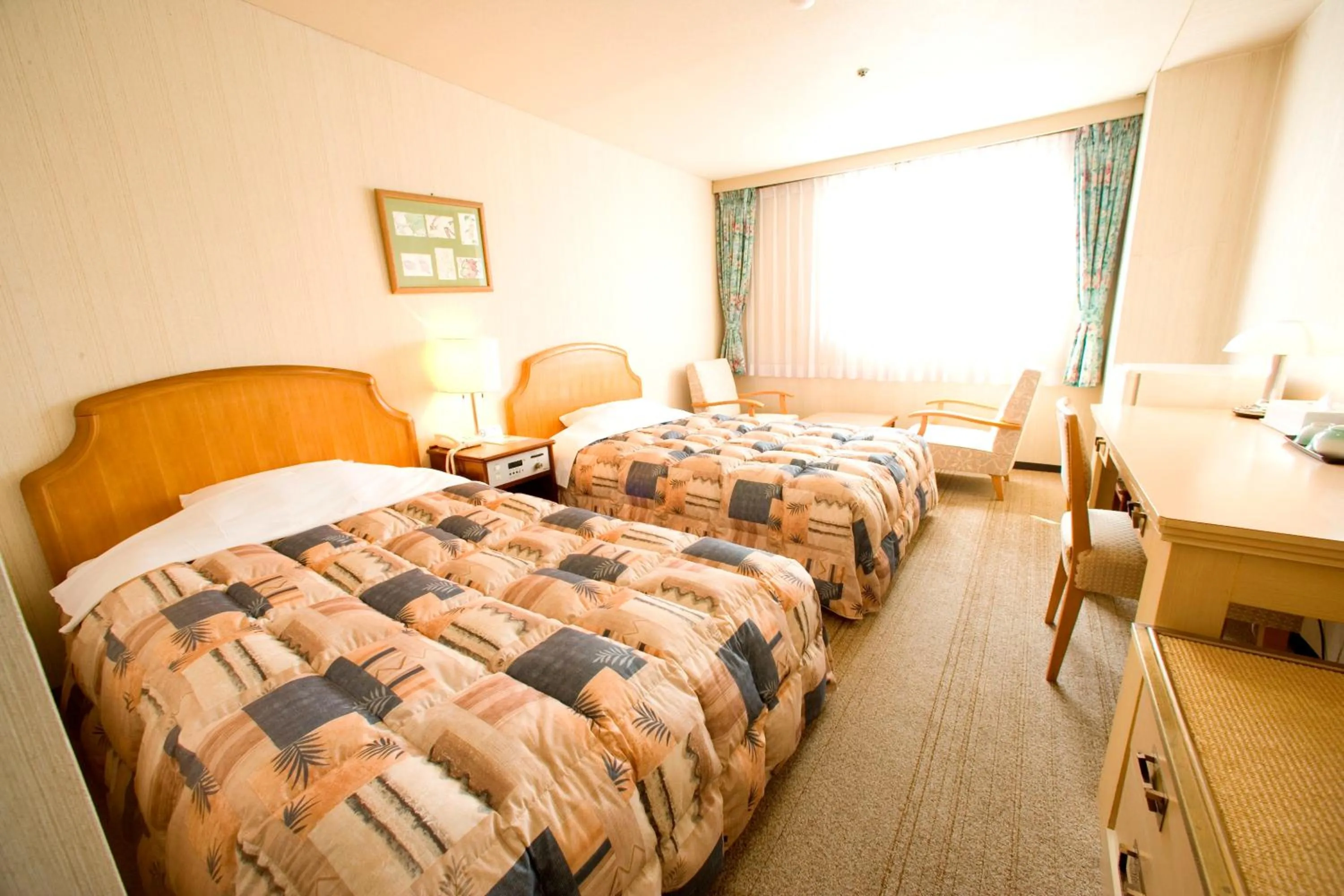 Bedroom in Okido Hotel