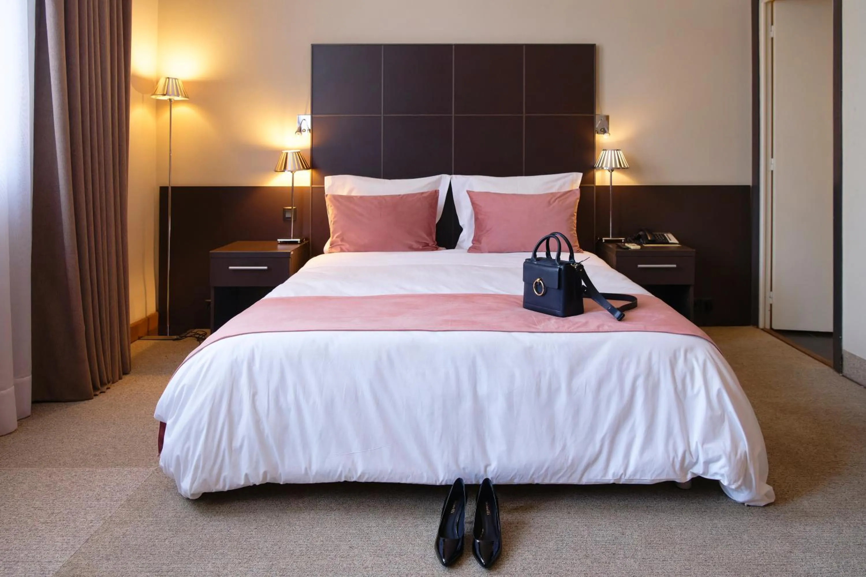 Bed in TANA-Boutique Hôtel