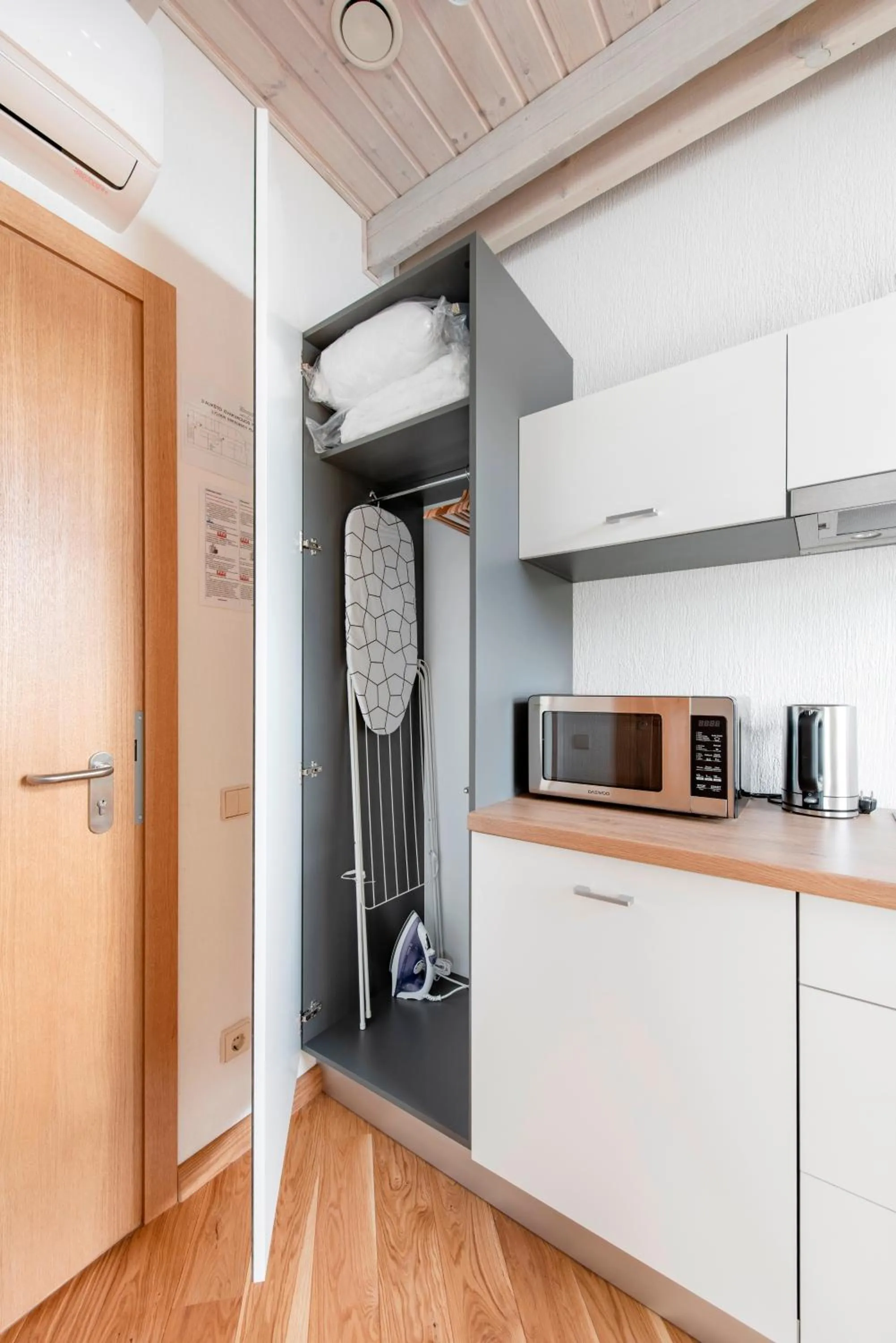 Kitchen or kitchenette in Piano Apartments