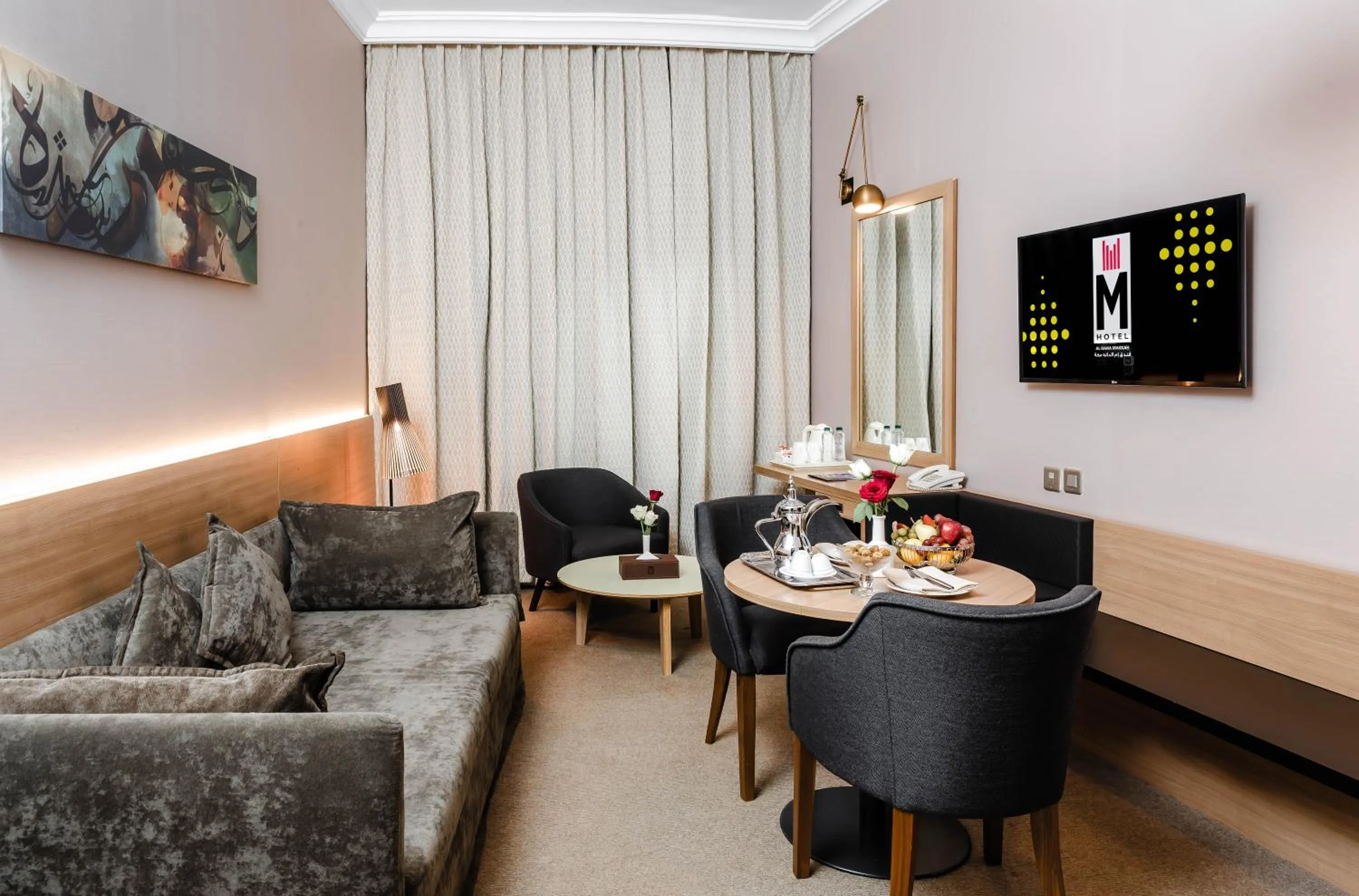 Communal lounge/ TV room in M Hotel Al Dana Makkah by Millennium