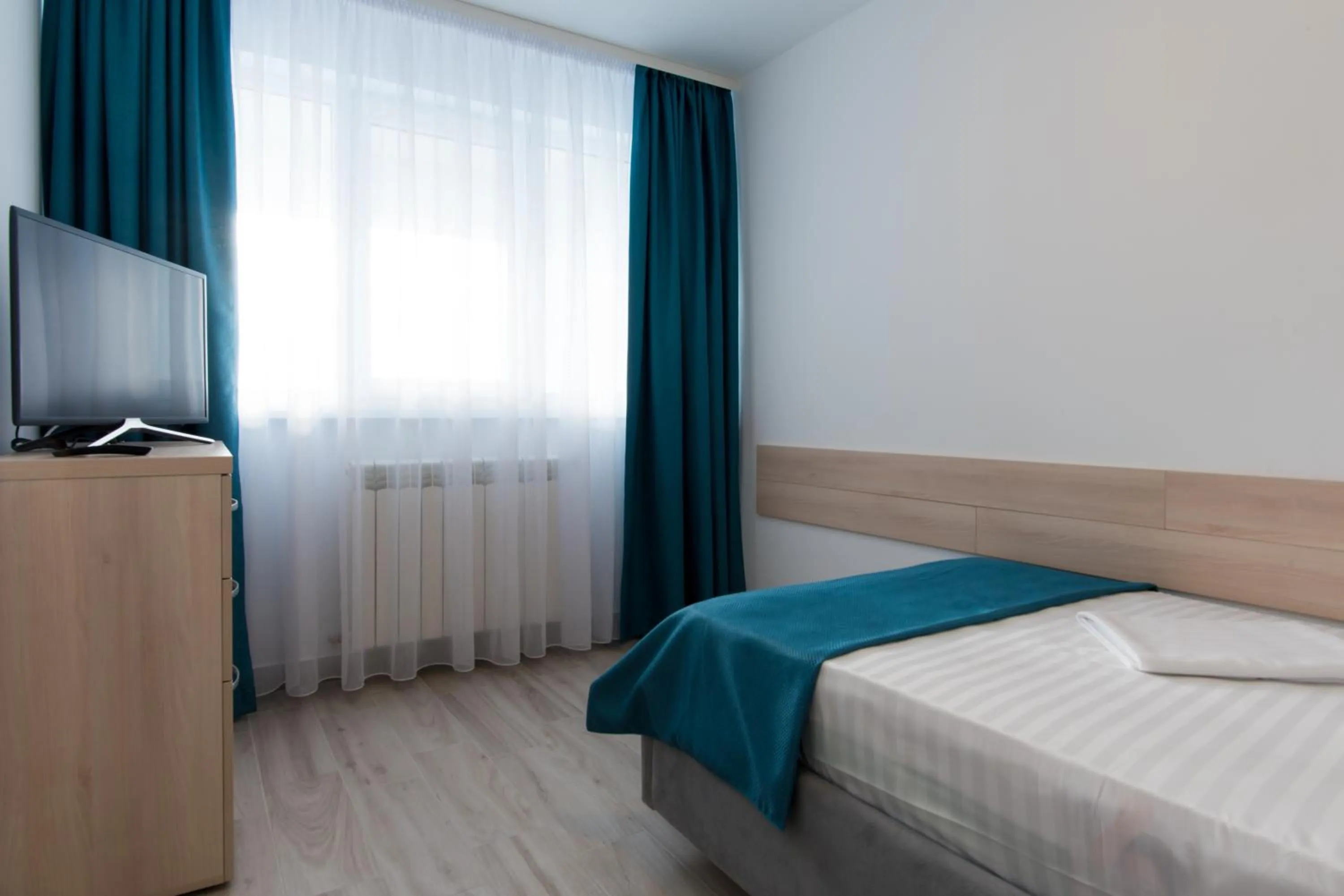 Bed in Turquoise Boutique