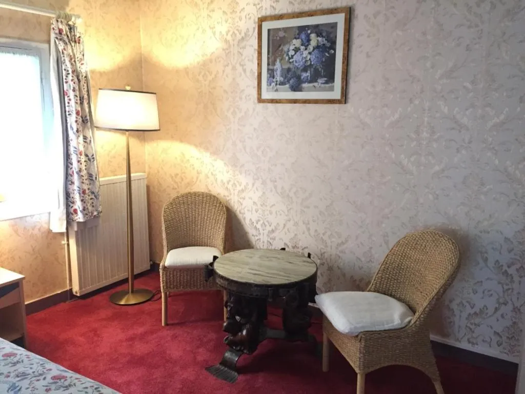 Bedroom in Le Manoir de Bellerive