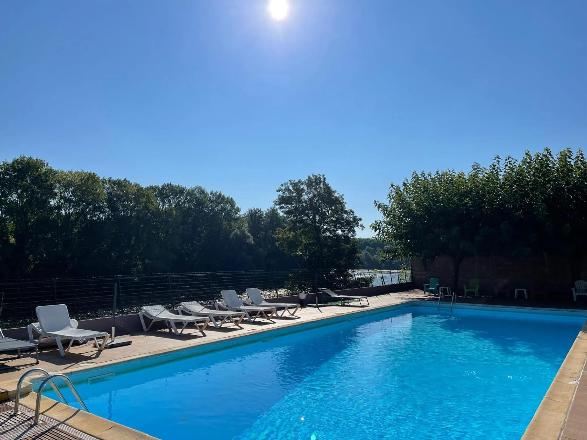Pool view in Le Manoir de Bellerive