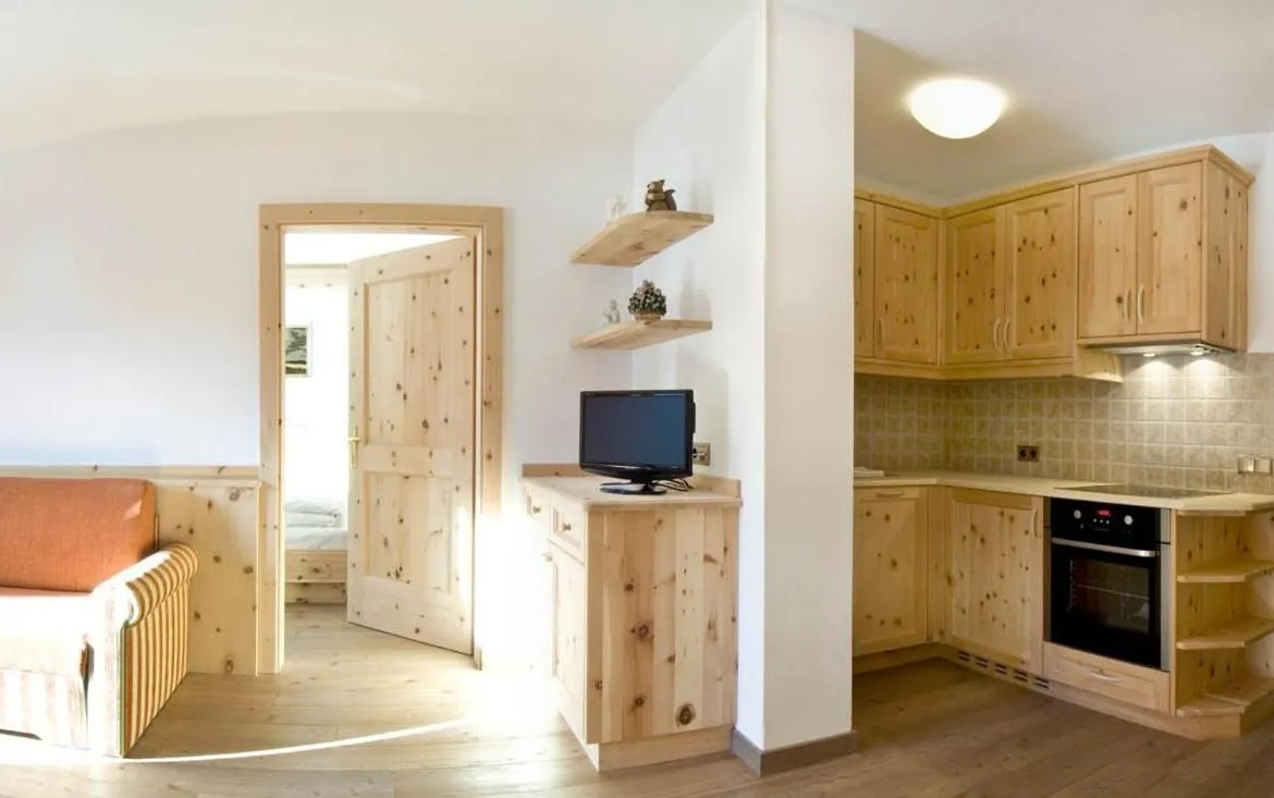 Kitchen or kitchenette in Family and Wellness Residence Ciasa Antersies