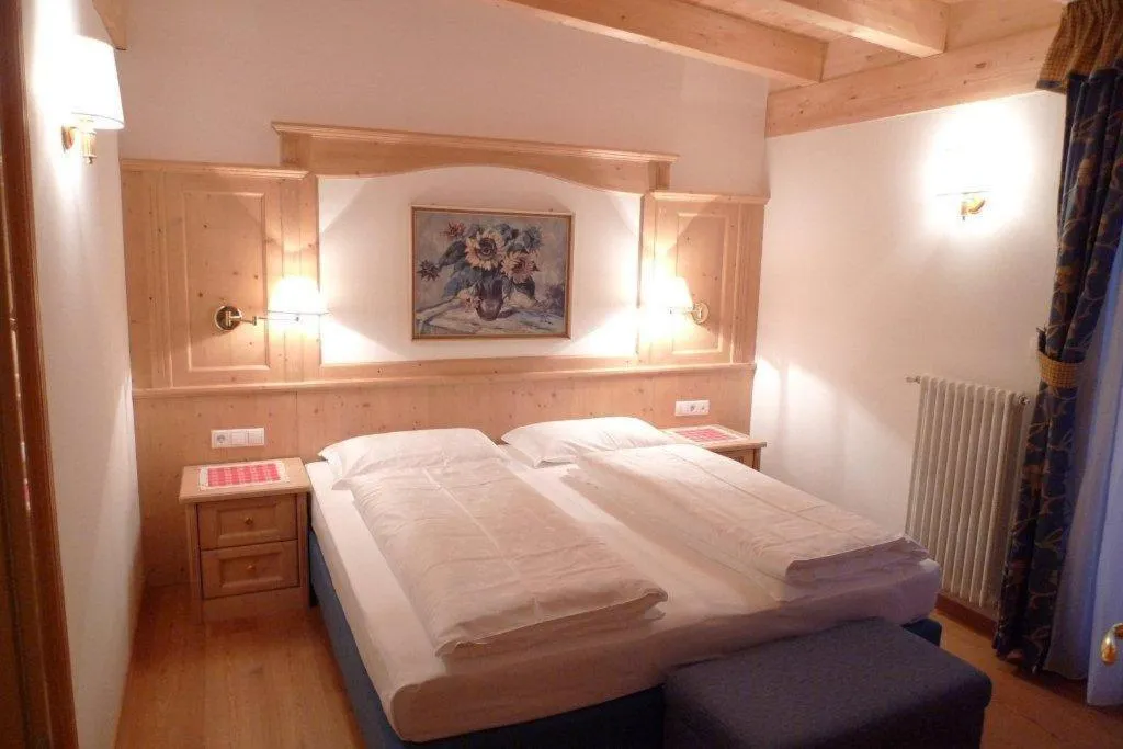 Bedroom, Bed in Family and Wellness Residence Ciasa Antersies