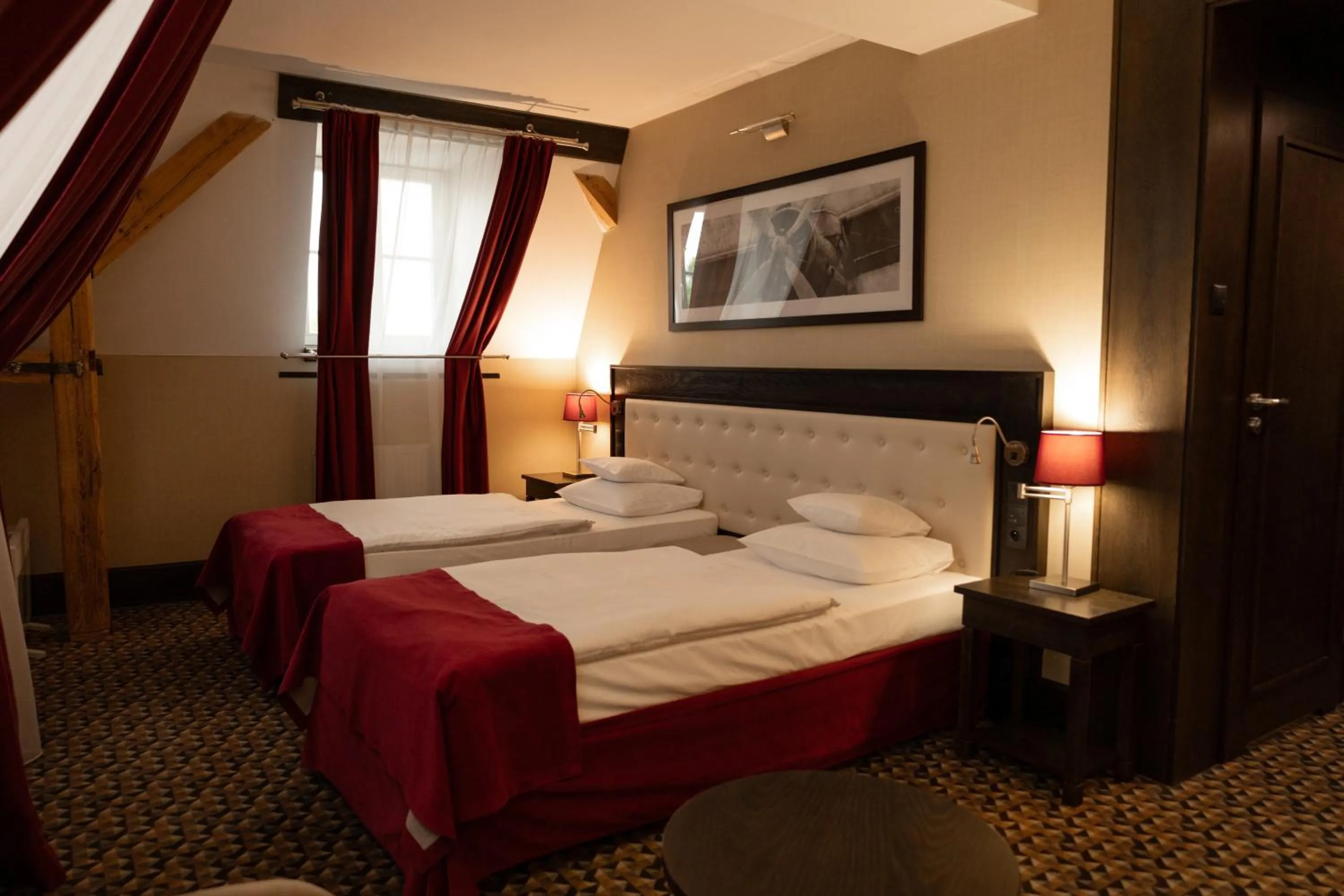 Bed in Red Baron Hotel & Restaurant