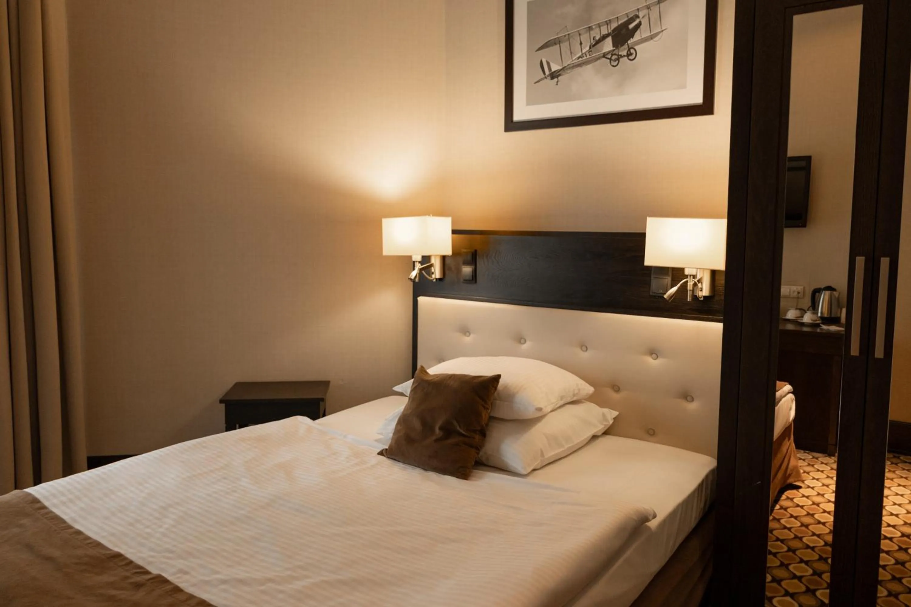 Bed in Red Baron Hotel & Restaurant