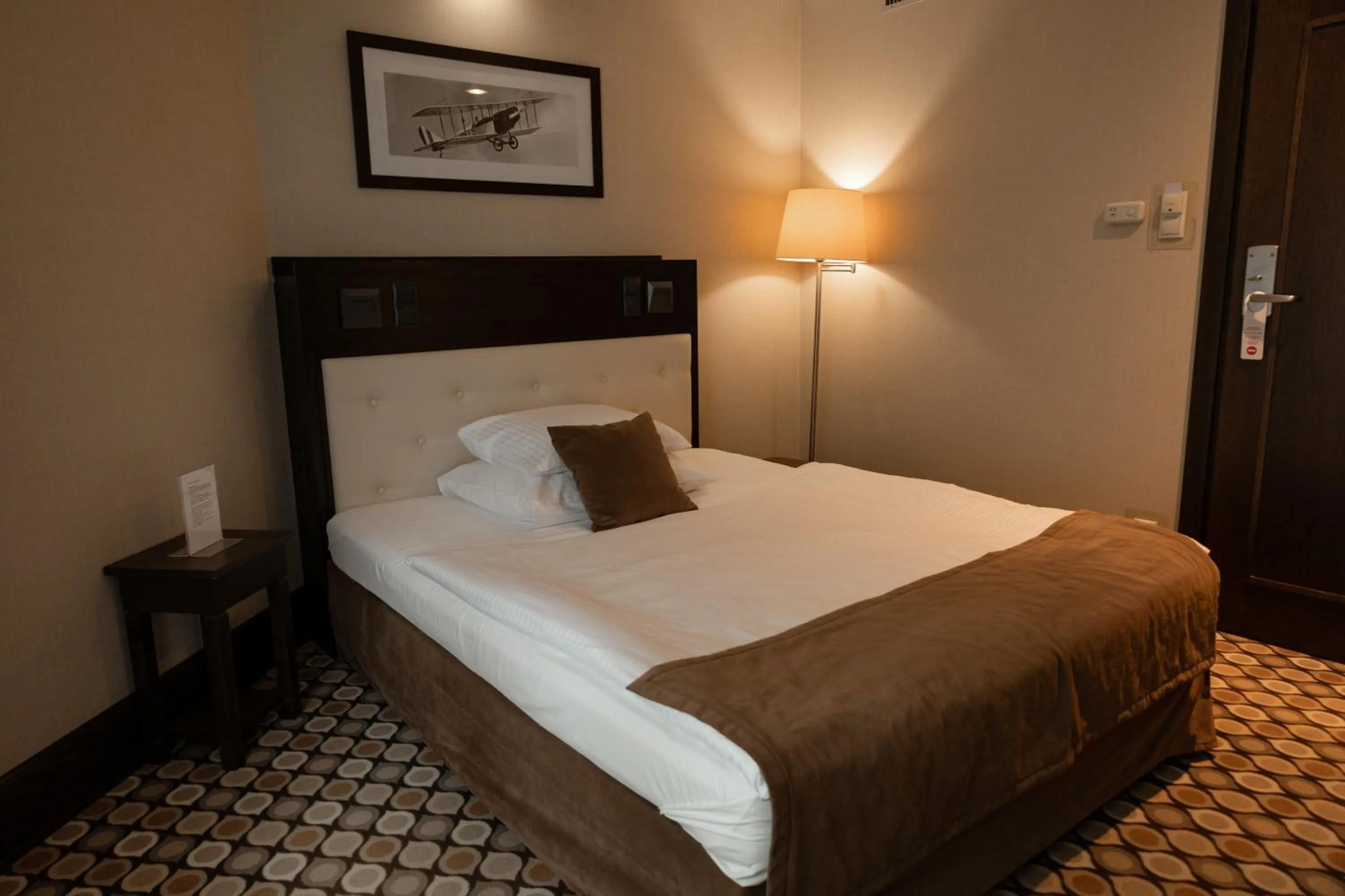 Bed in Red Baron Hotel & Restaurant