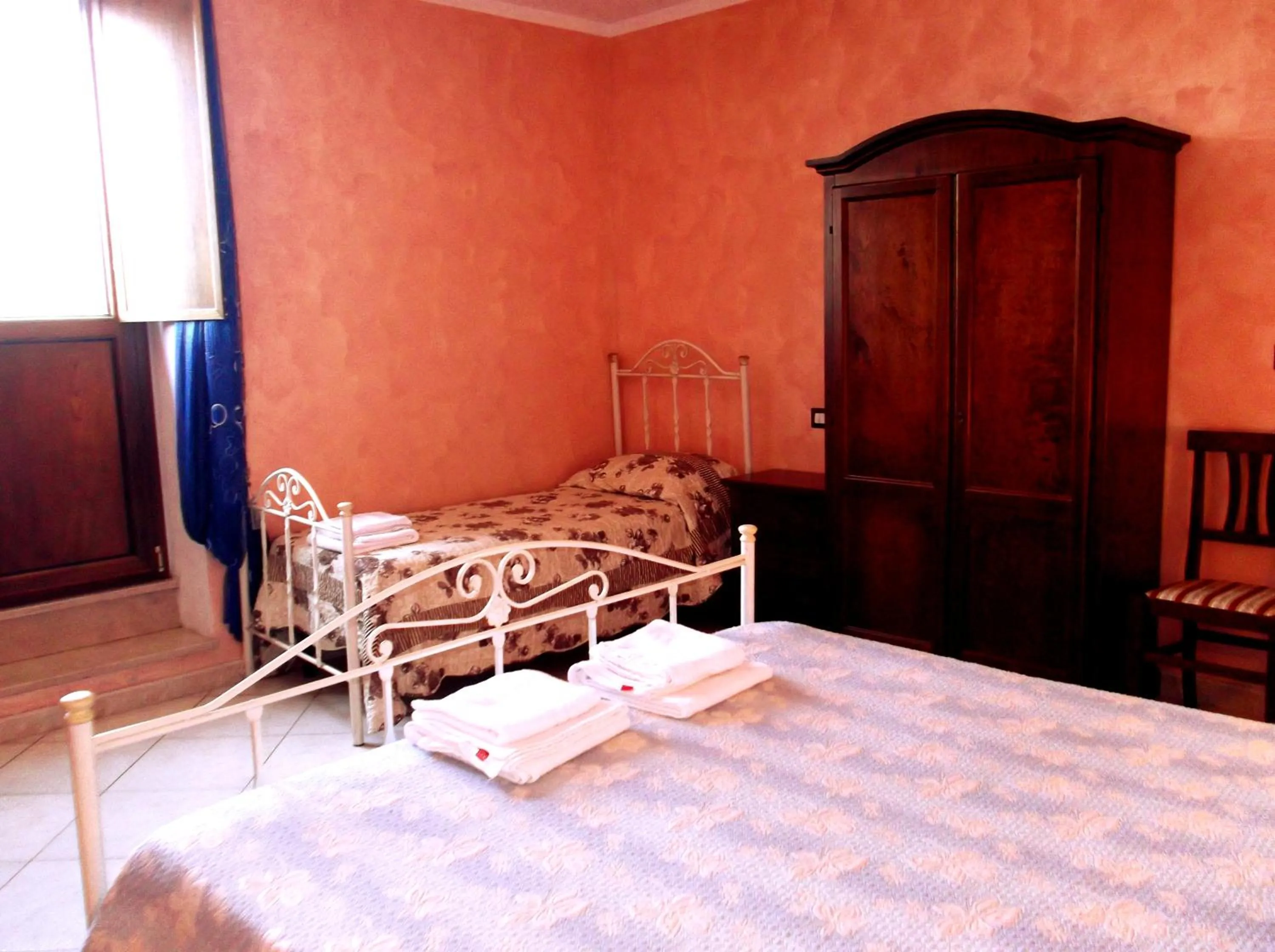 Bed in Dolcedorme Bed And Breakfast