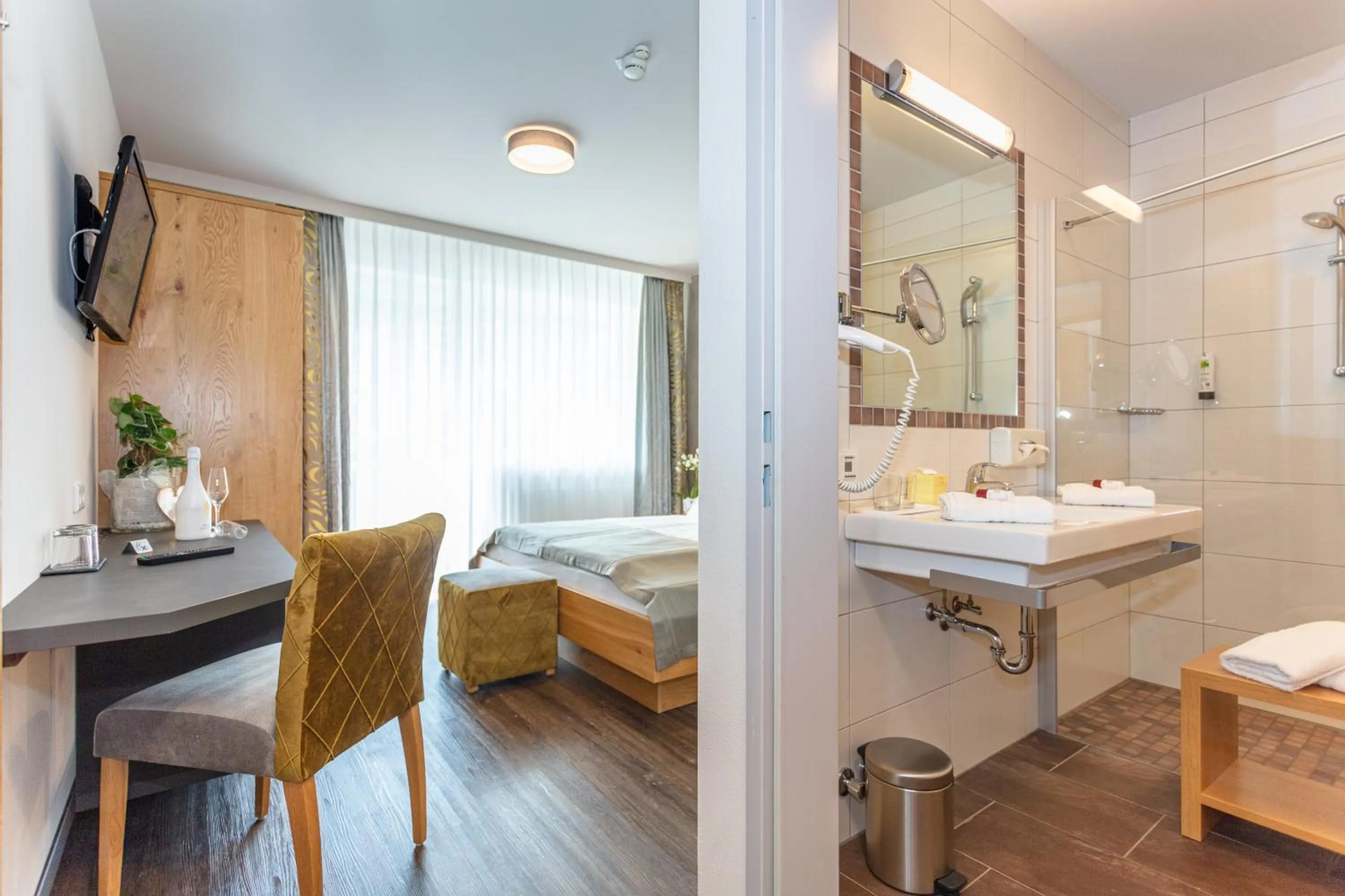 Bathroom, Bed in Hotel Almrausch