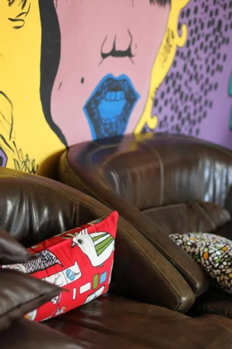 Communal lounge/ TV room, Seating Area in Corner Hostel