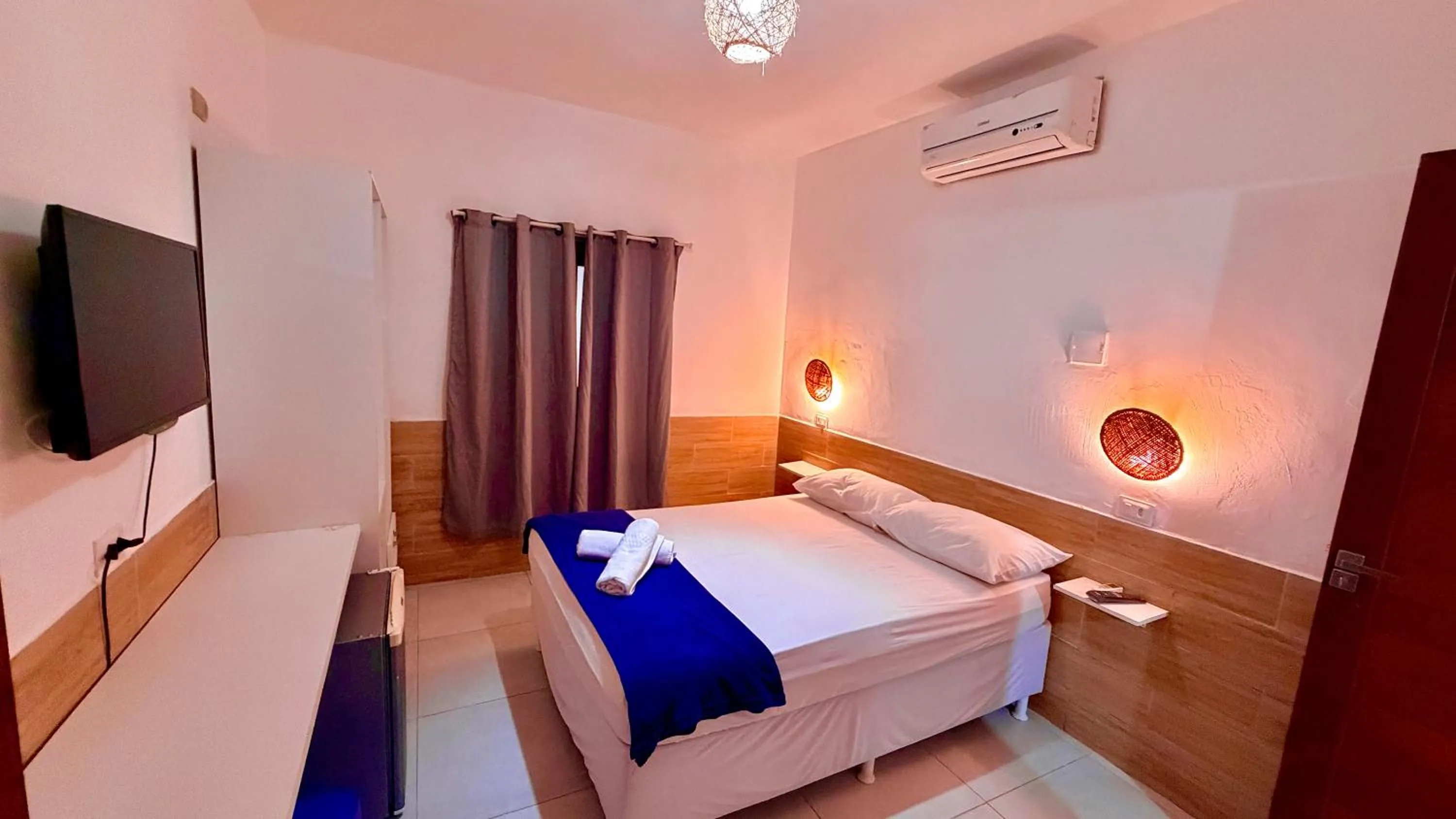 Bed in Paranambuca Pousada