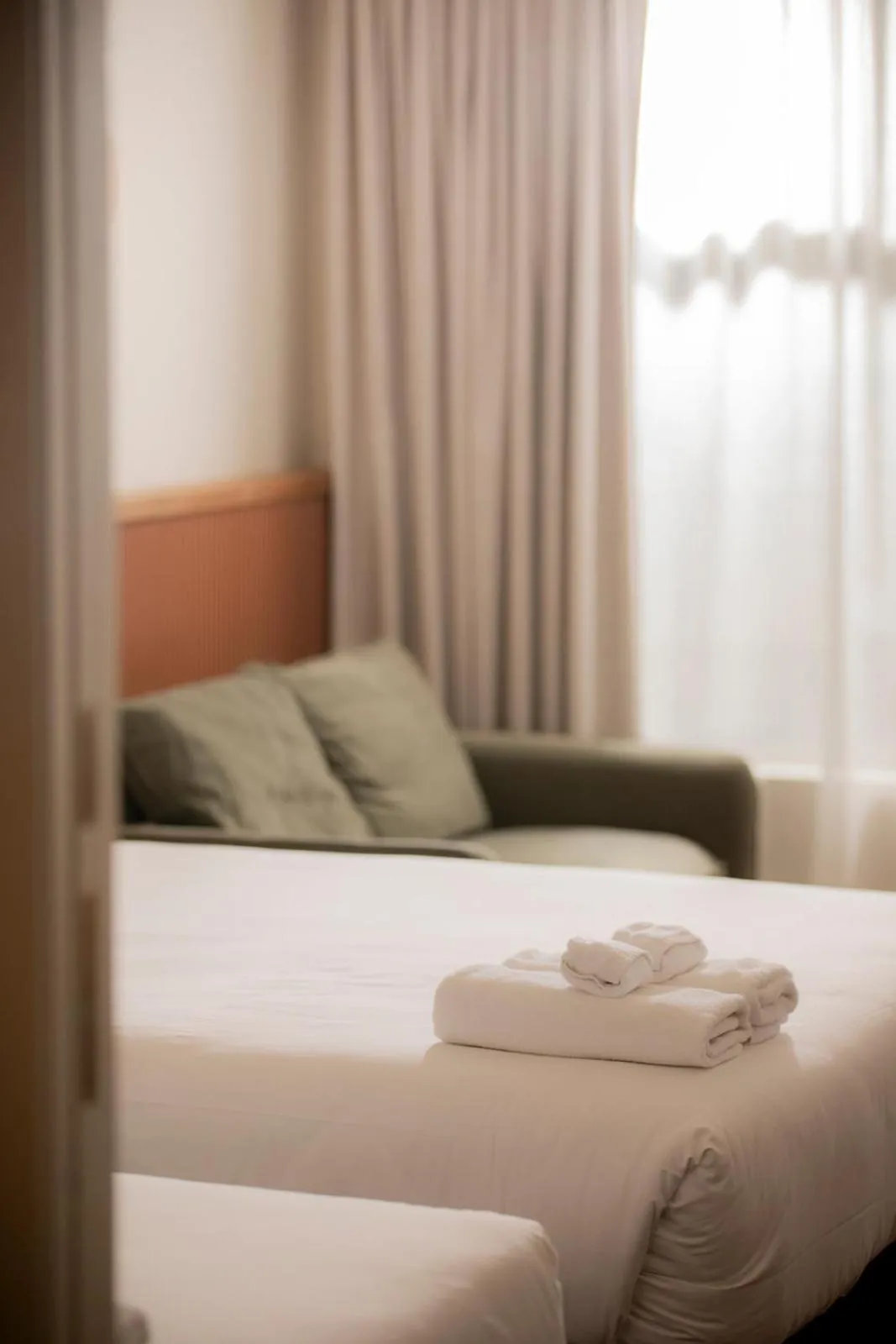 Bed in The Alluna Motel, an Ascend Collection Hotel