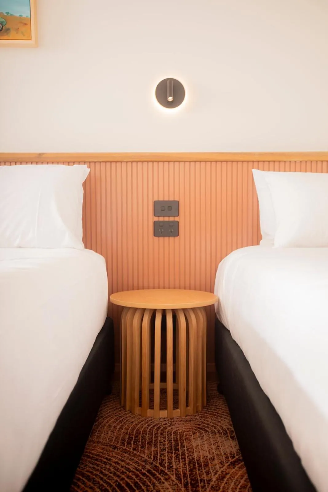 Bed in The Alluna Motel, an Ascend Collection Hotel