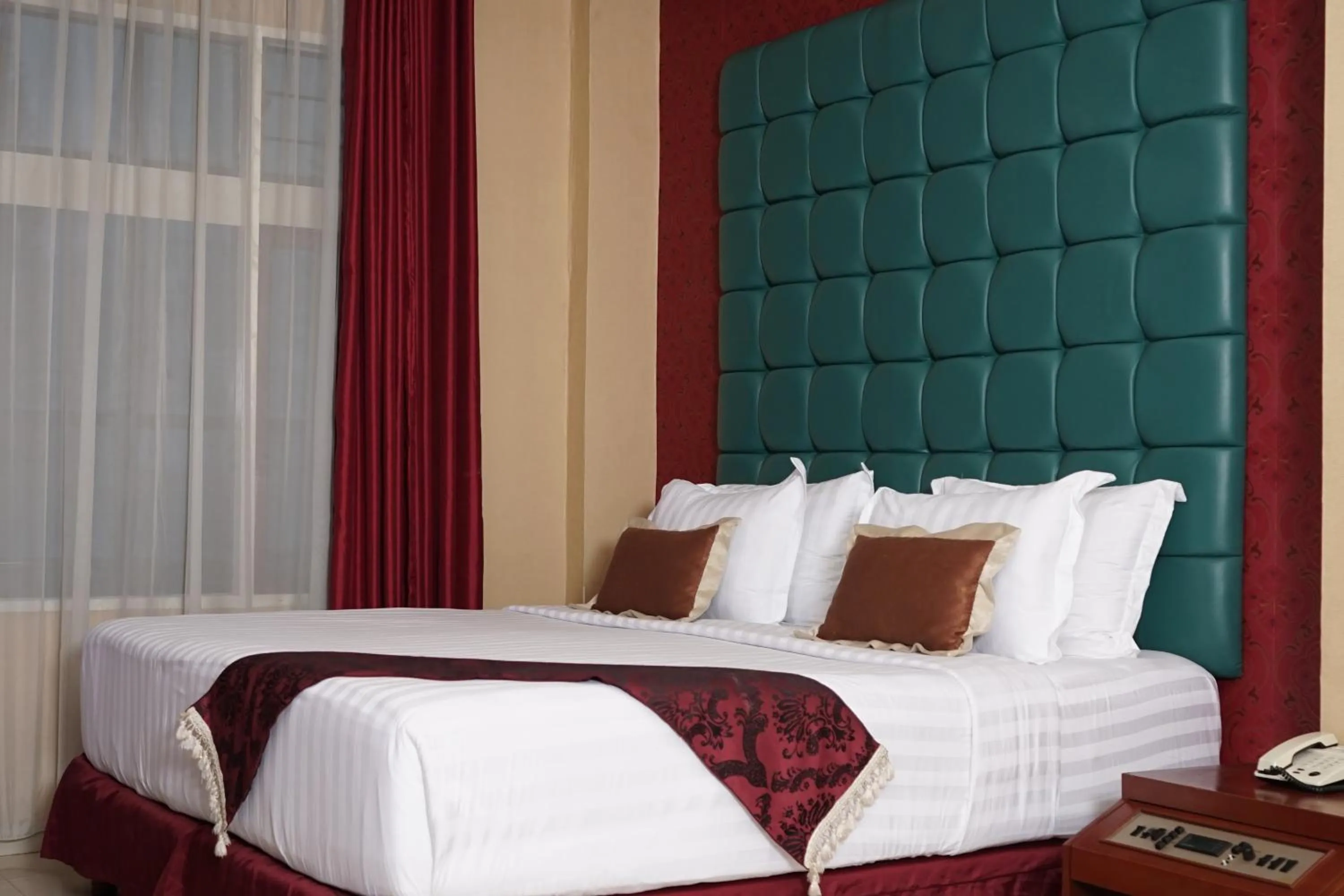 Bed in Rudang Hotel & Resort Berastagi