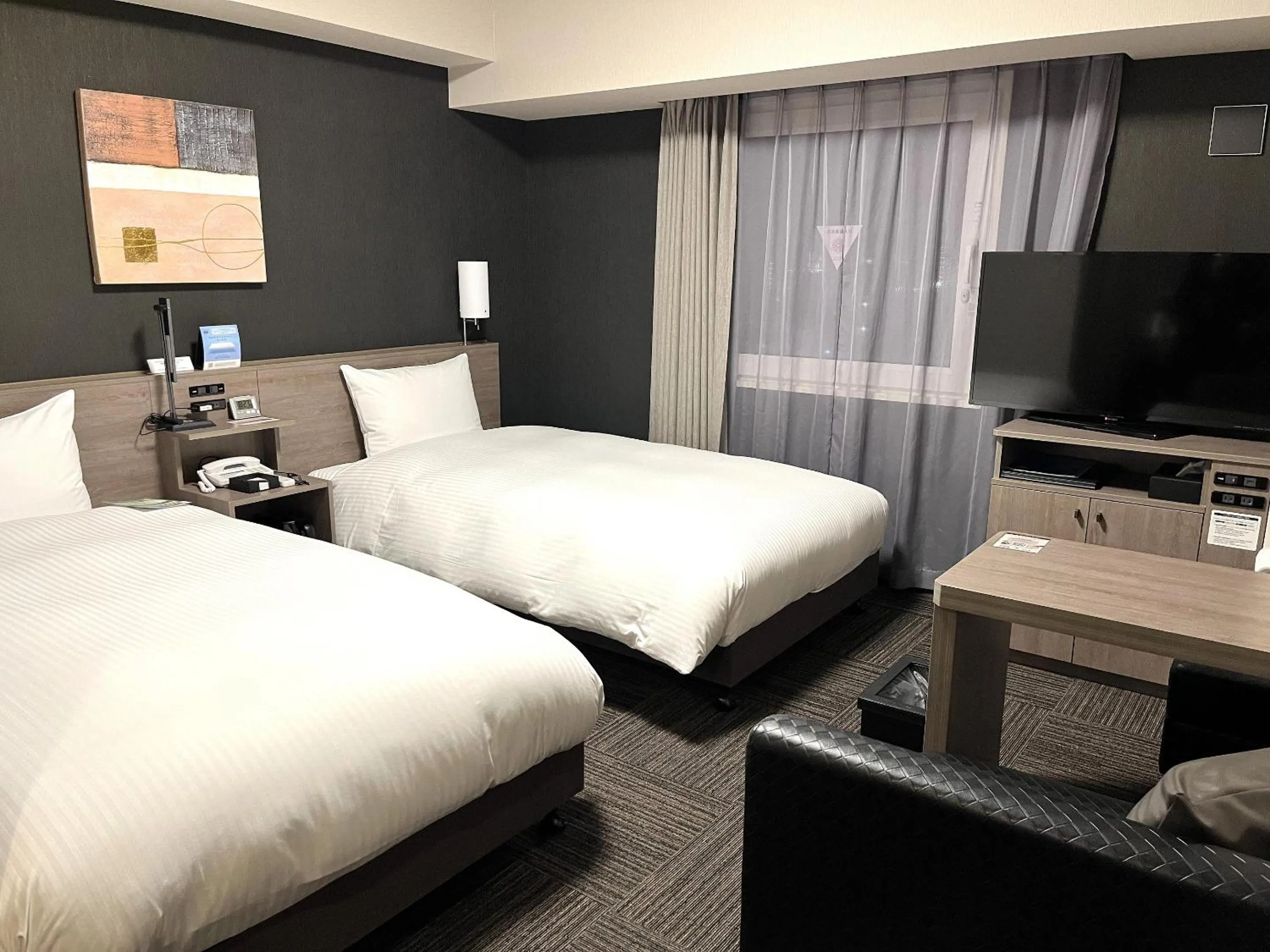 Photo of the whole room, Bed in Hotel Route Inn Takamatsu Yashima
