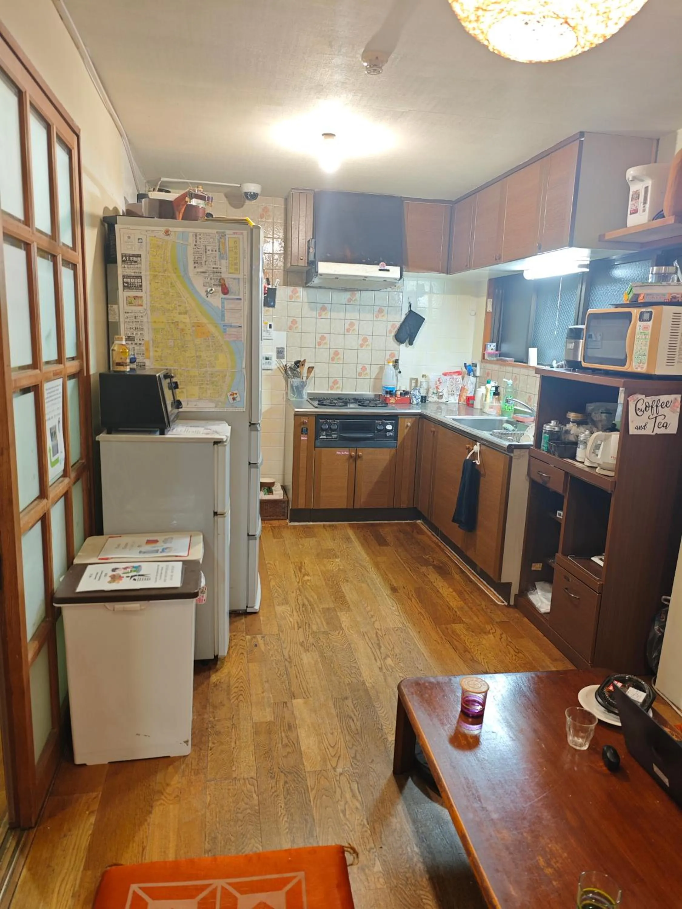 Kitchen or kitchenette in Peace House Sakura