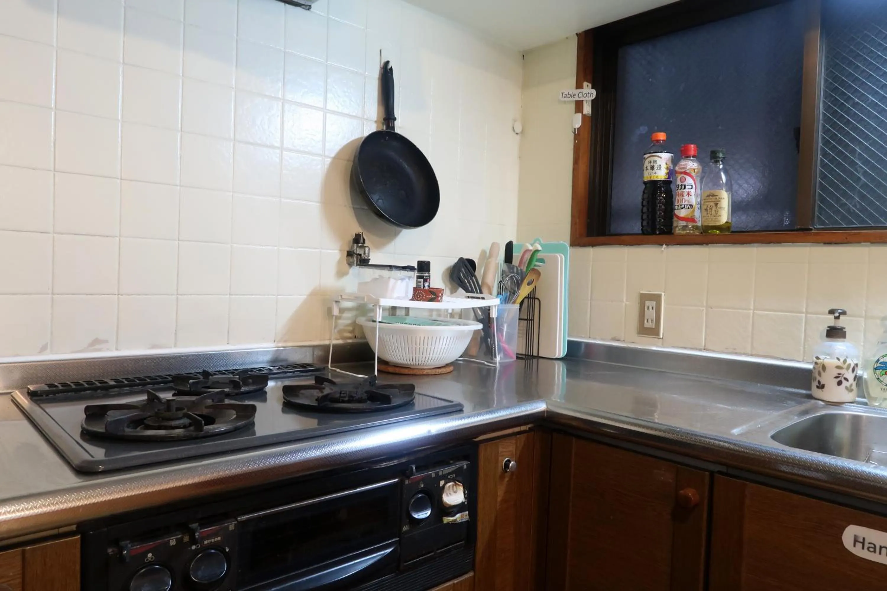 Kitchen or kitchenette in Peace House Sakura