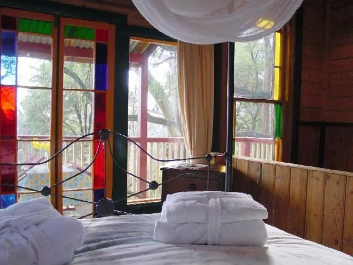 Bed in Como Cottage Accommodation