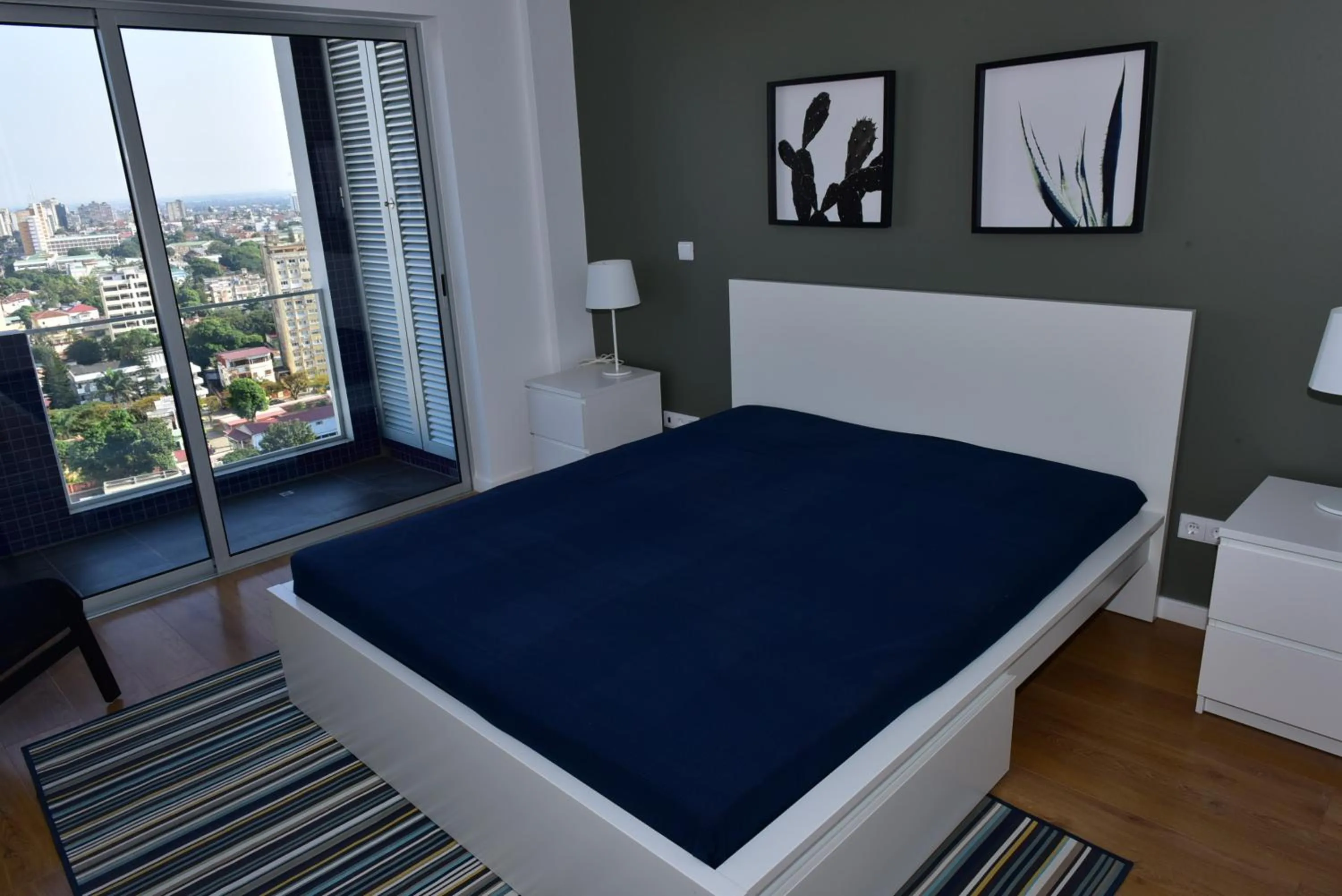 Bed in Xenon Urban Apartments